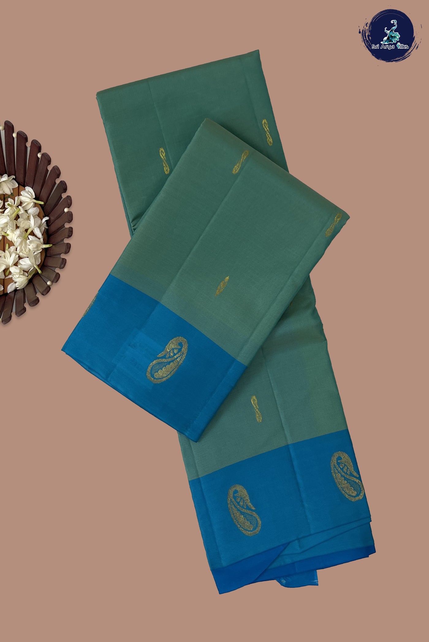 Bluish Green Light Weight Silk Saree With Zari Buttas Pattern