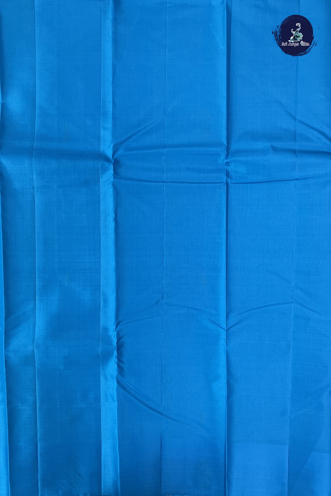 Bluish Green Light Weight Silk Saree With Zari Buttas Pattern