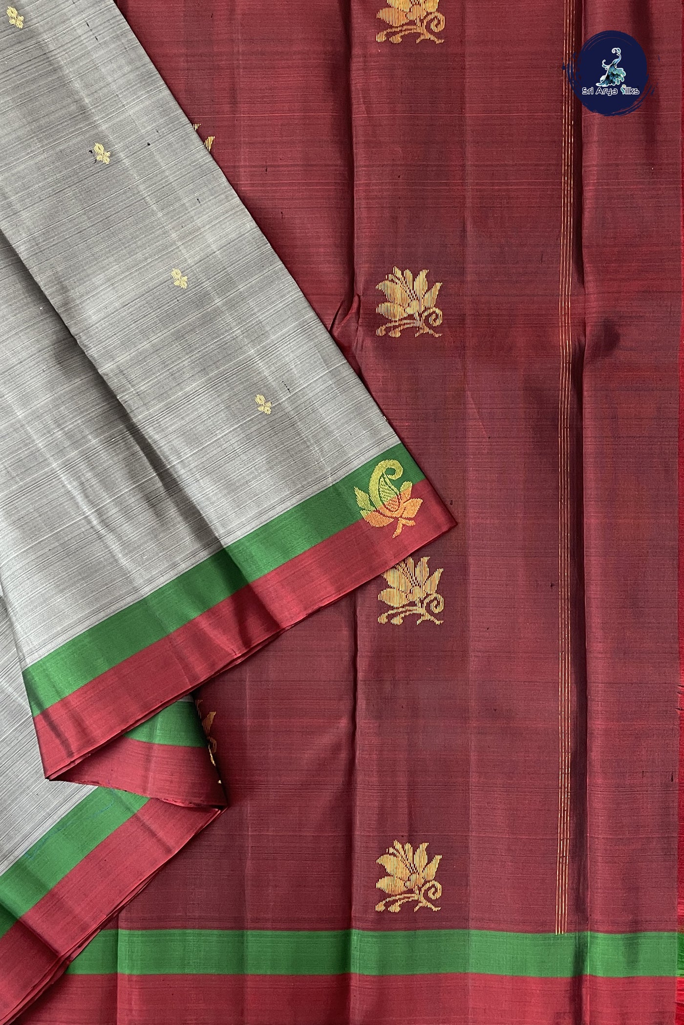 Grey Light Weight Silk Saree With Zari Buttas Pattern