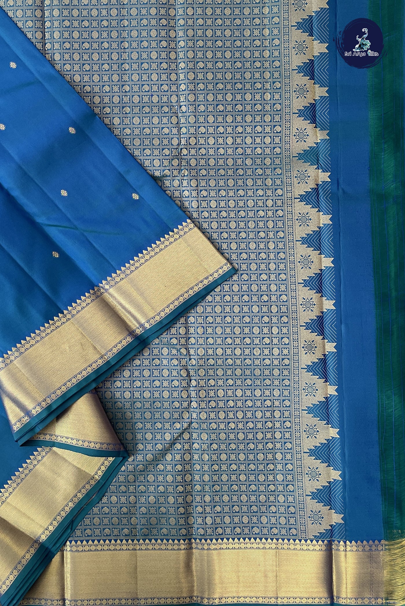 Peacock Blue Traditional Silk Saree With Zari Buttas Pattern