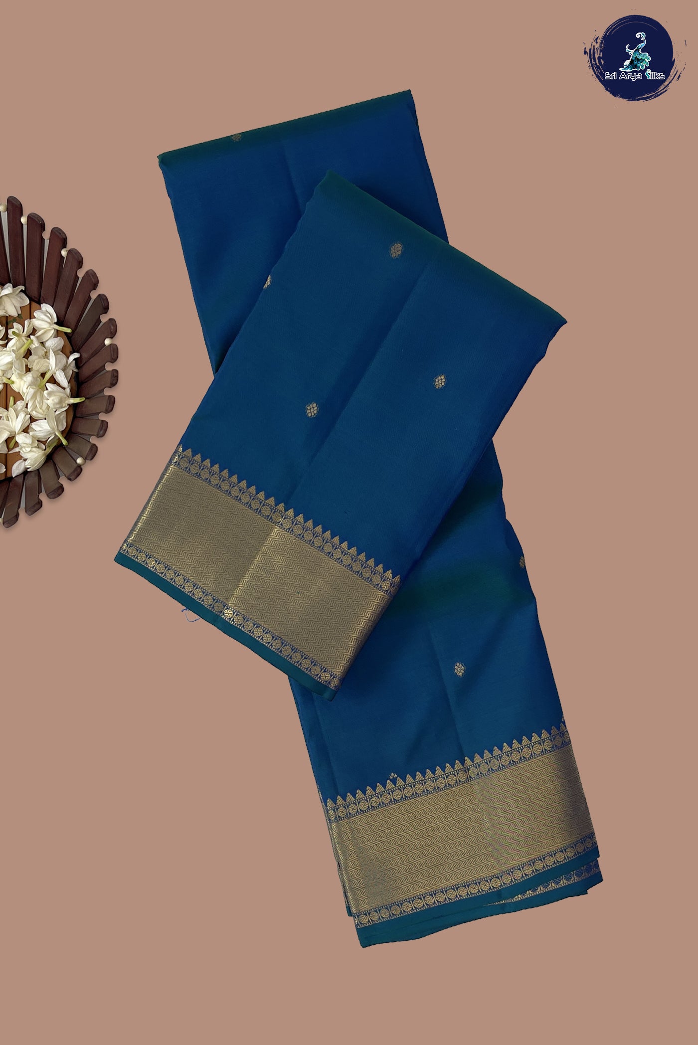 Peacock Blue Traditional Silk Saree With Zari Buttas Pattern