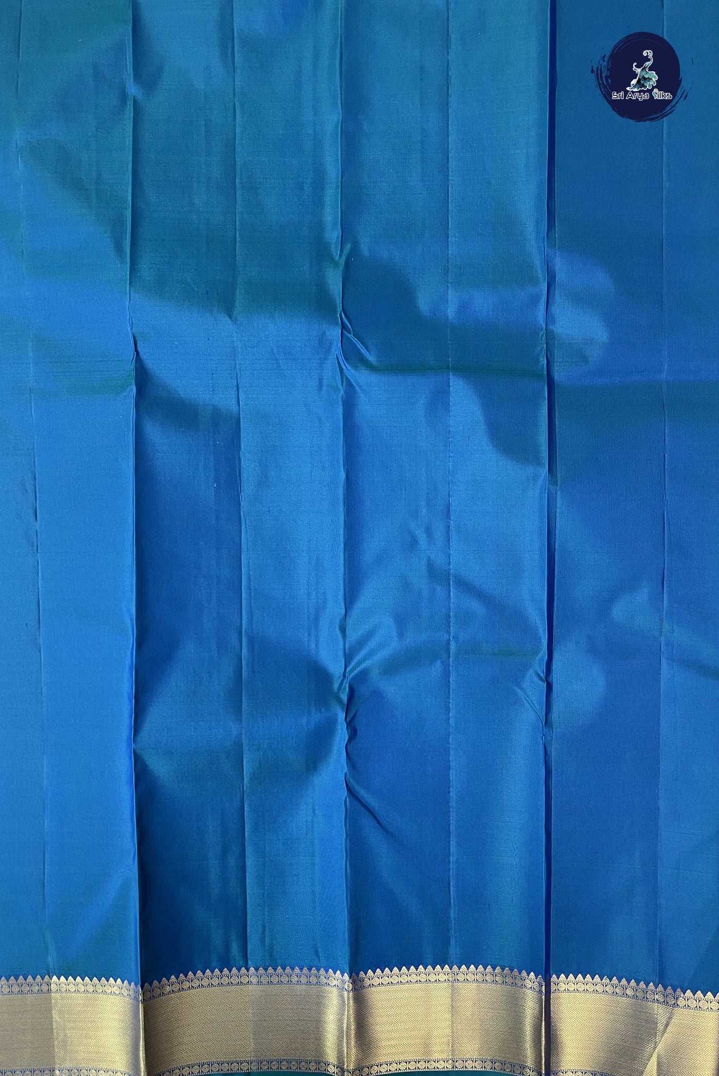 Peacock Blue Traditional Silk Saree With Zari Buttas Pattern