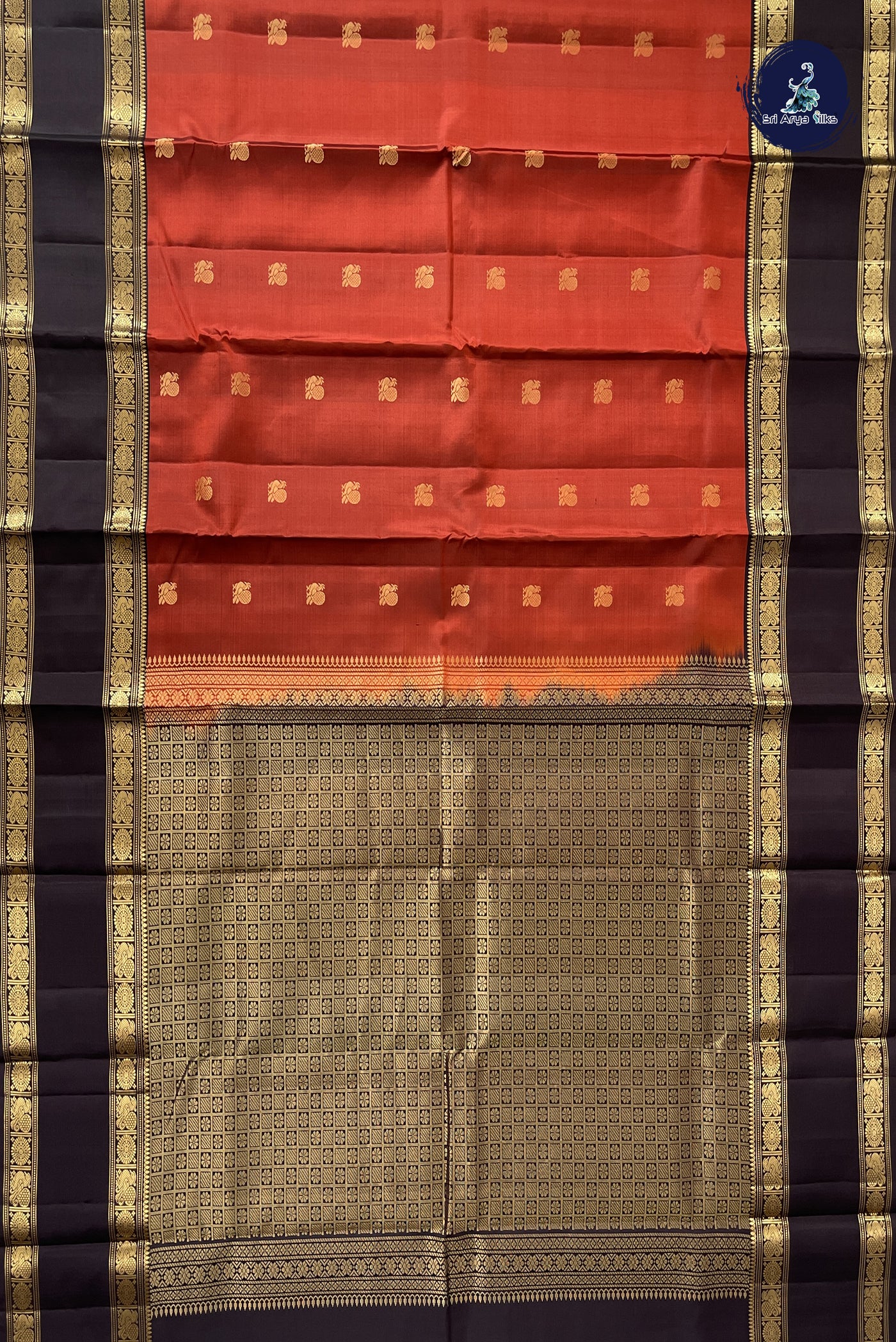 Rust Traditional Silk Saree With Zari Buttas Pattern