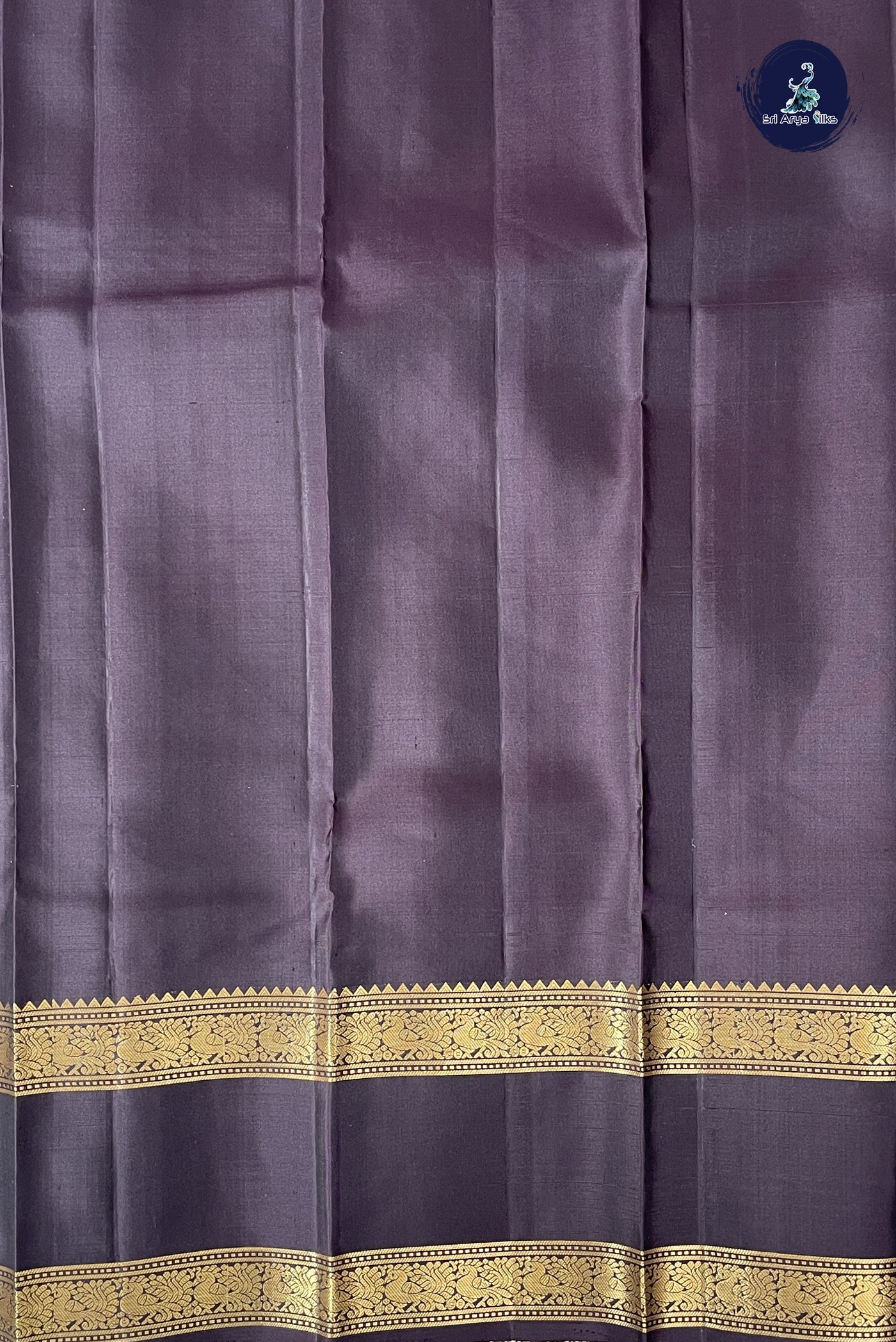 Lavender Traditional Silk Saree With Zari Buttas Pattern