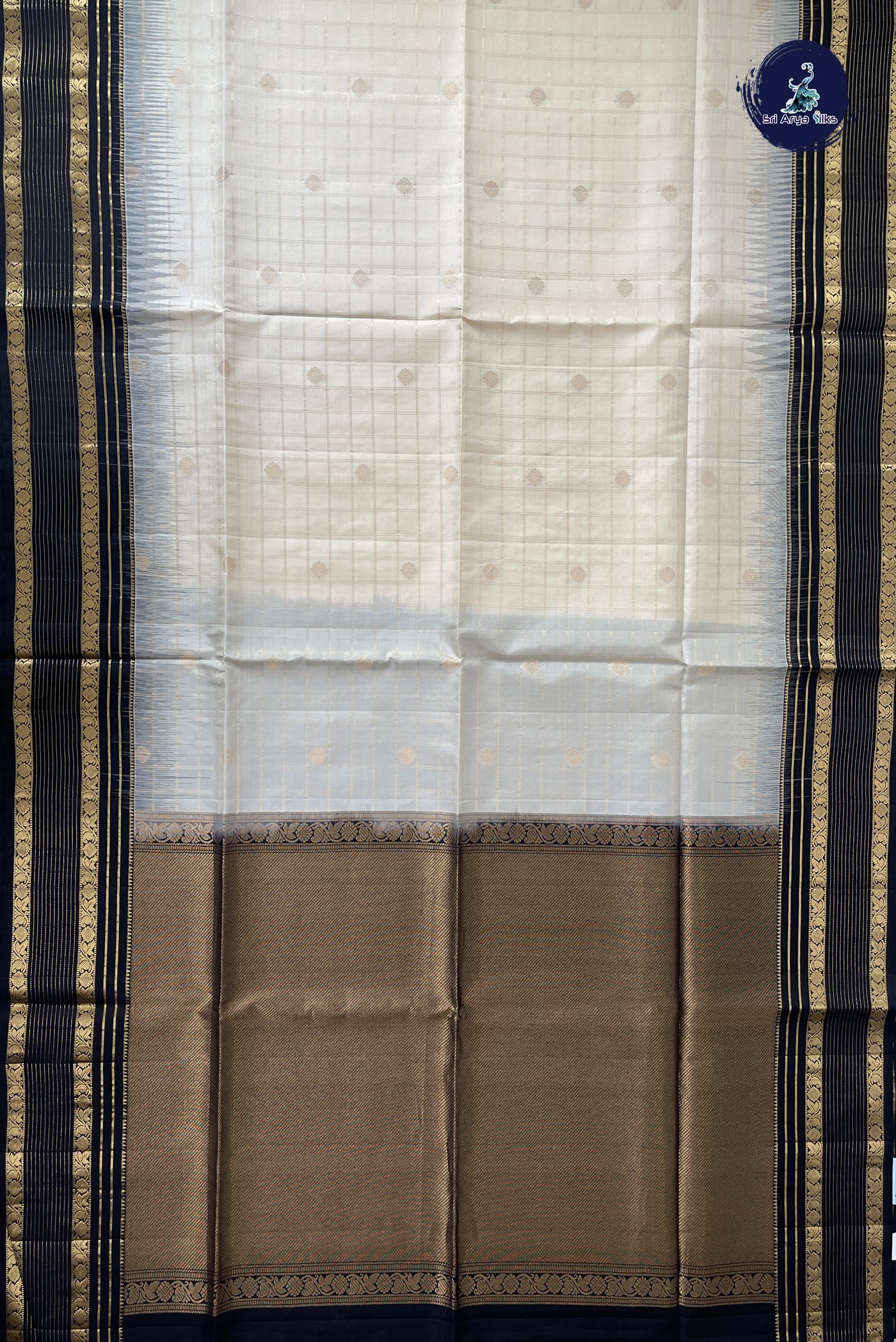 Off White Soft Silk Saree With Zari Buttas Pattern