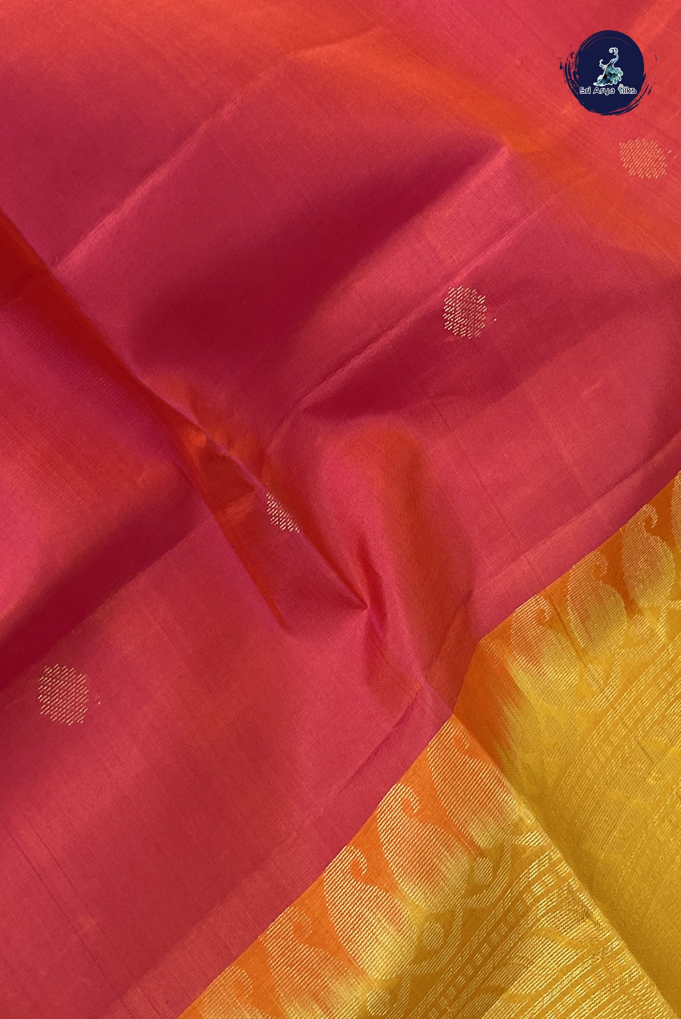 Orangish Pink Soft Silk Saree With Zari Buttas Pattern
