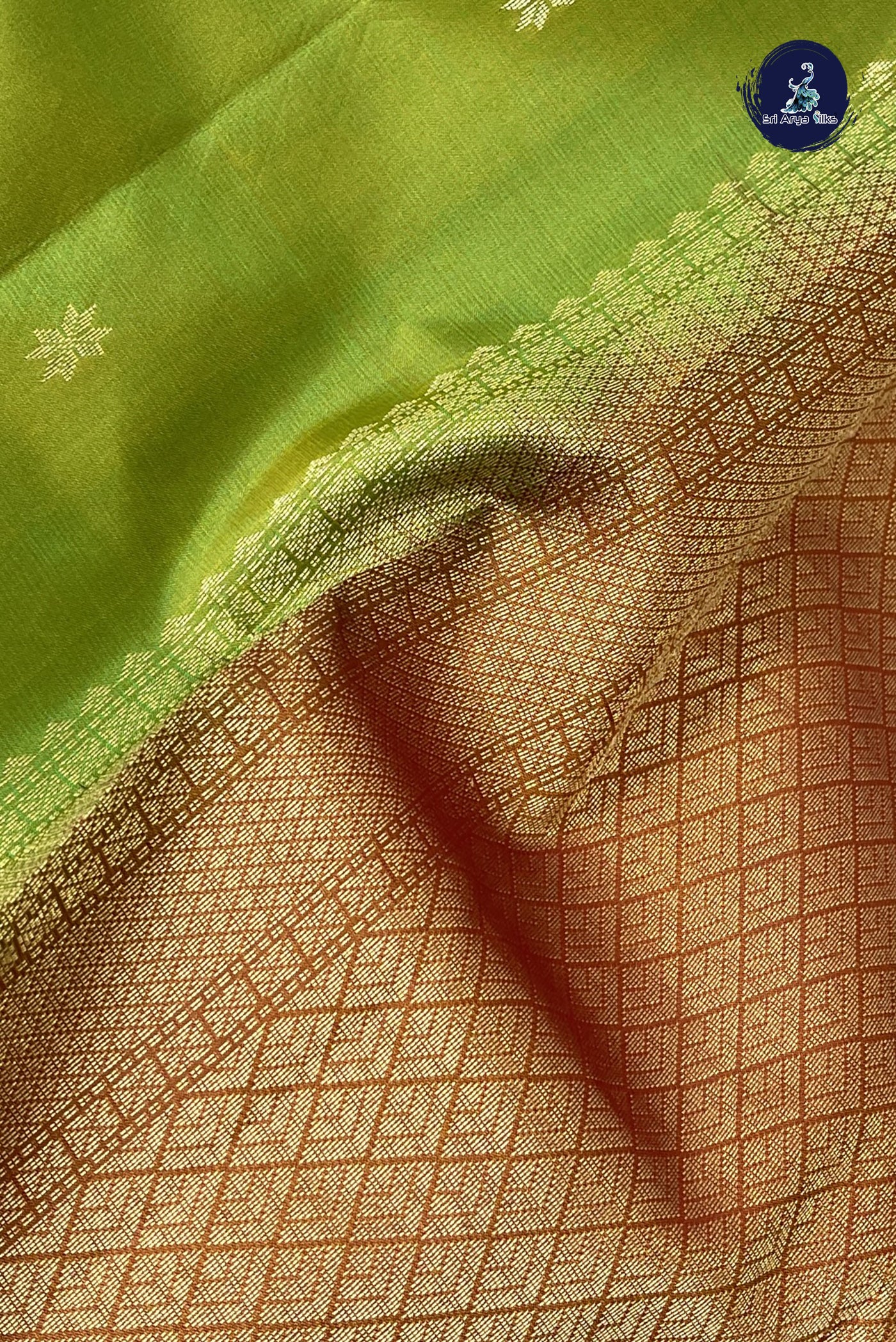 Lime Green Light Weight Silk Saree With Zari Buttas Pattern