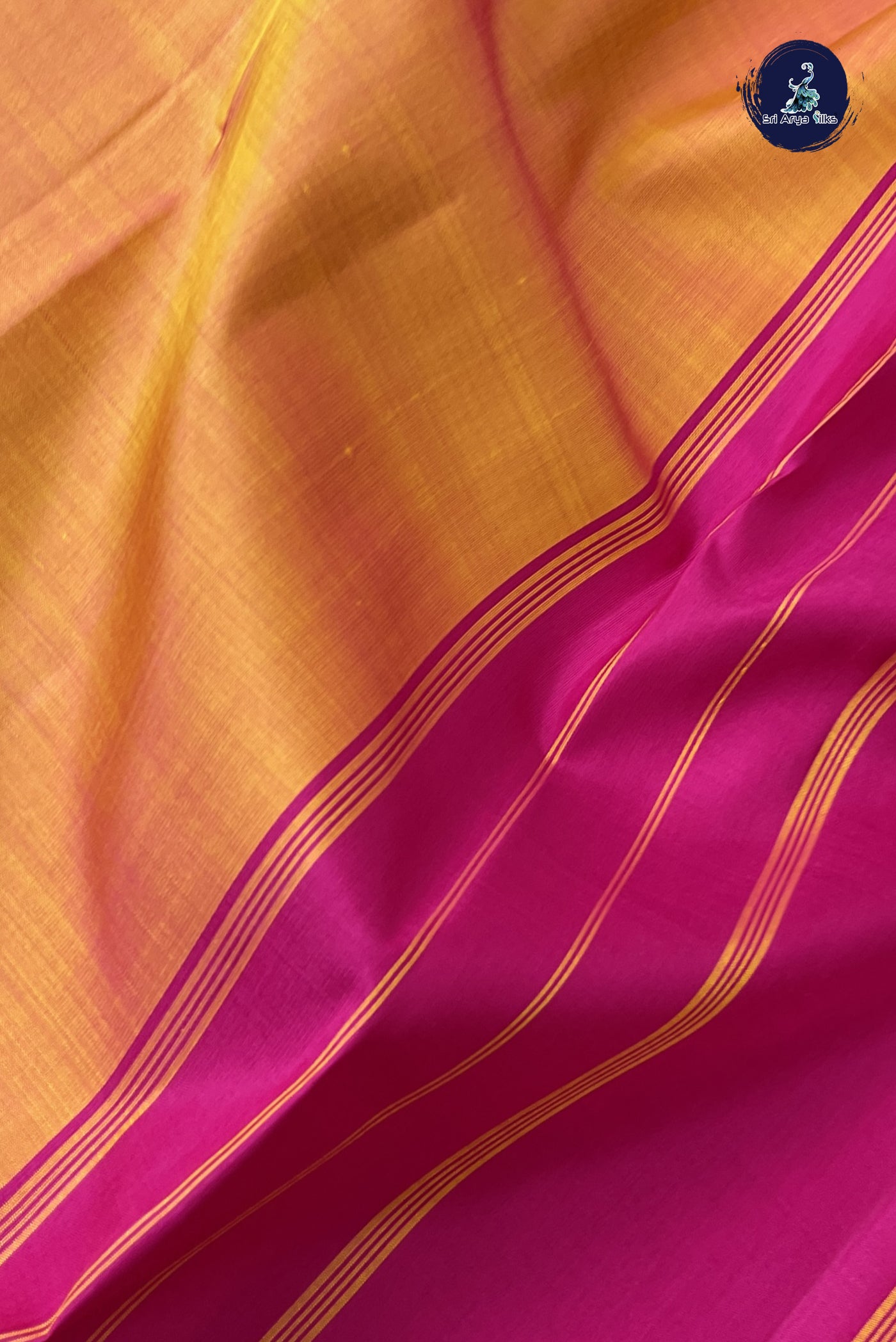 Lite Mustard Orange Traditional Silk Saree With Plain Pattern