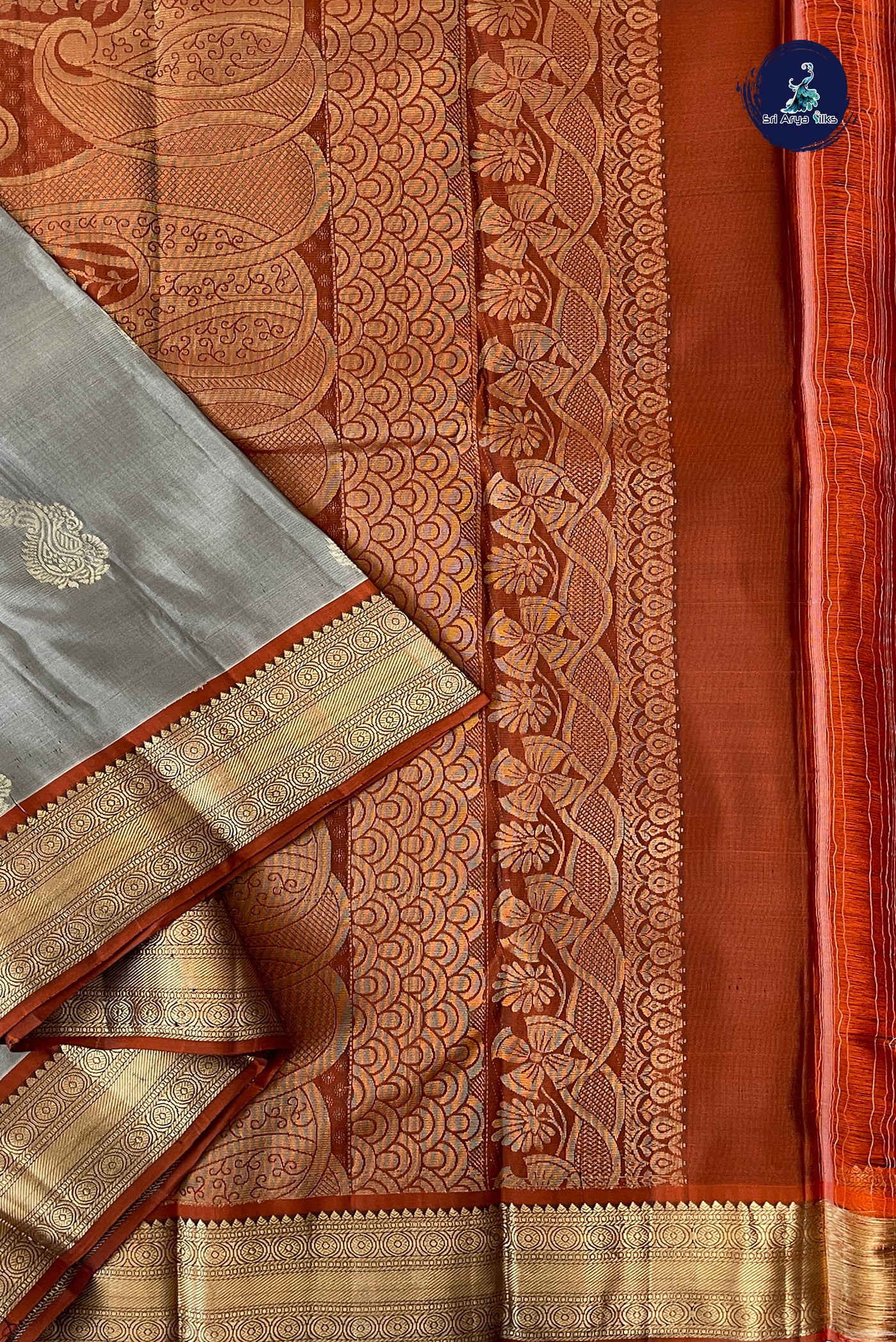 Grey Half Pure Silk Saree With Zari Buttas Pattern