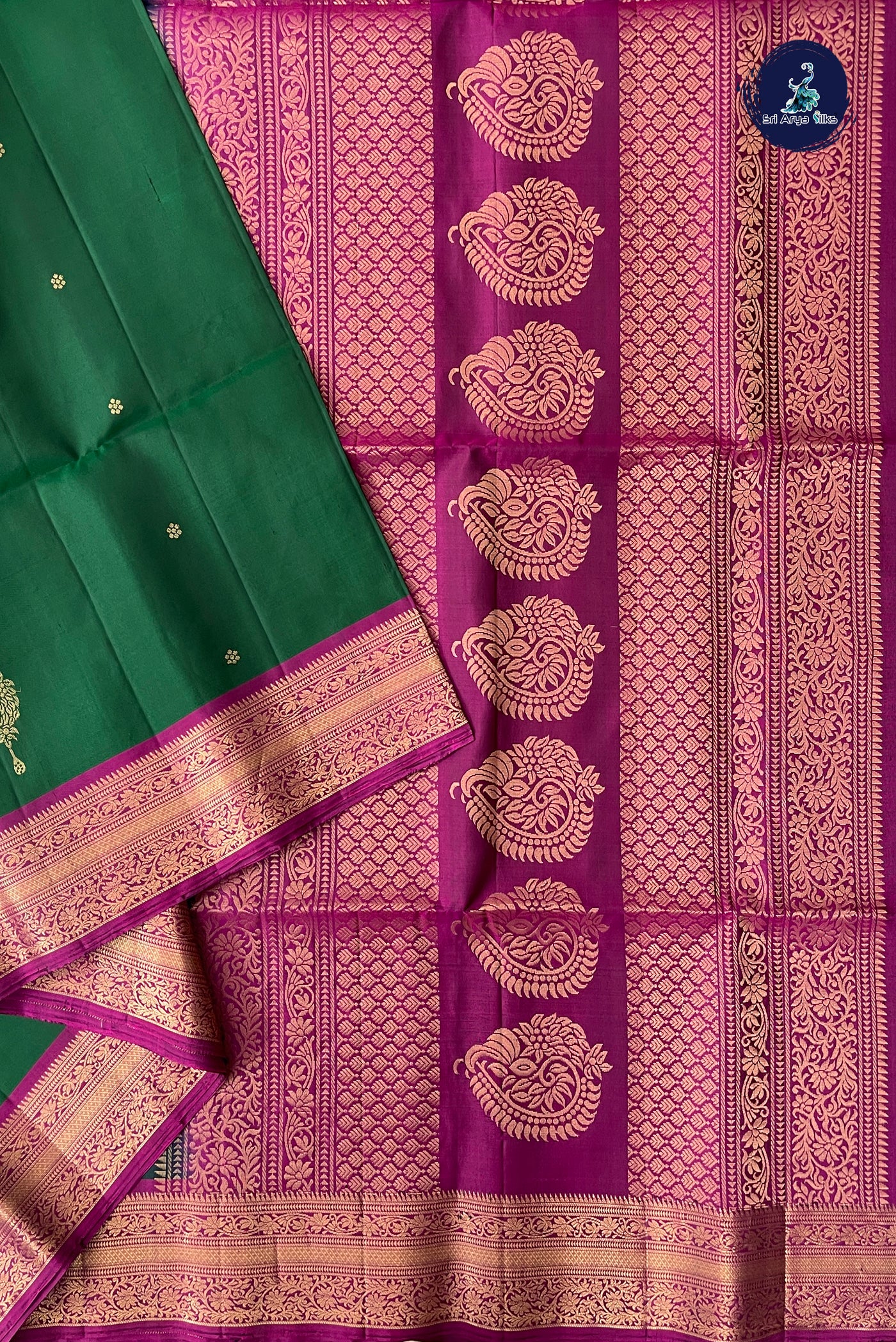 Bottle Green Soft Silk Saree With Zari Buttas Pattern