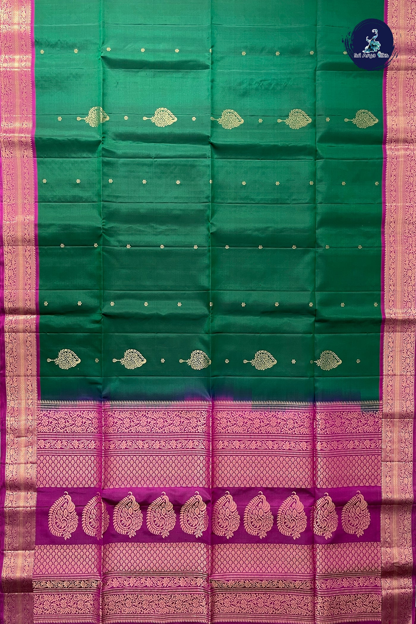 Bottle Green Soft Silk Saree With Zari Buttas Pattern