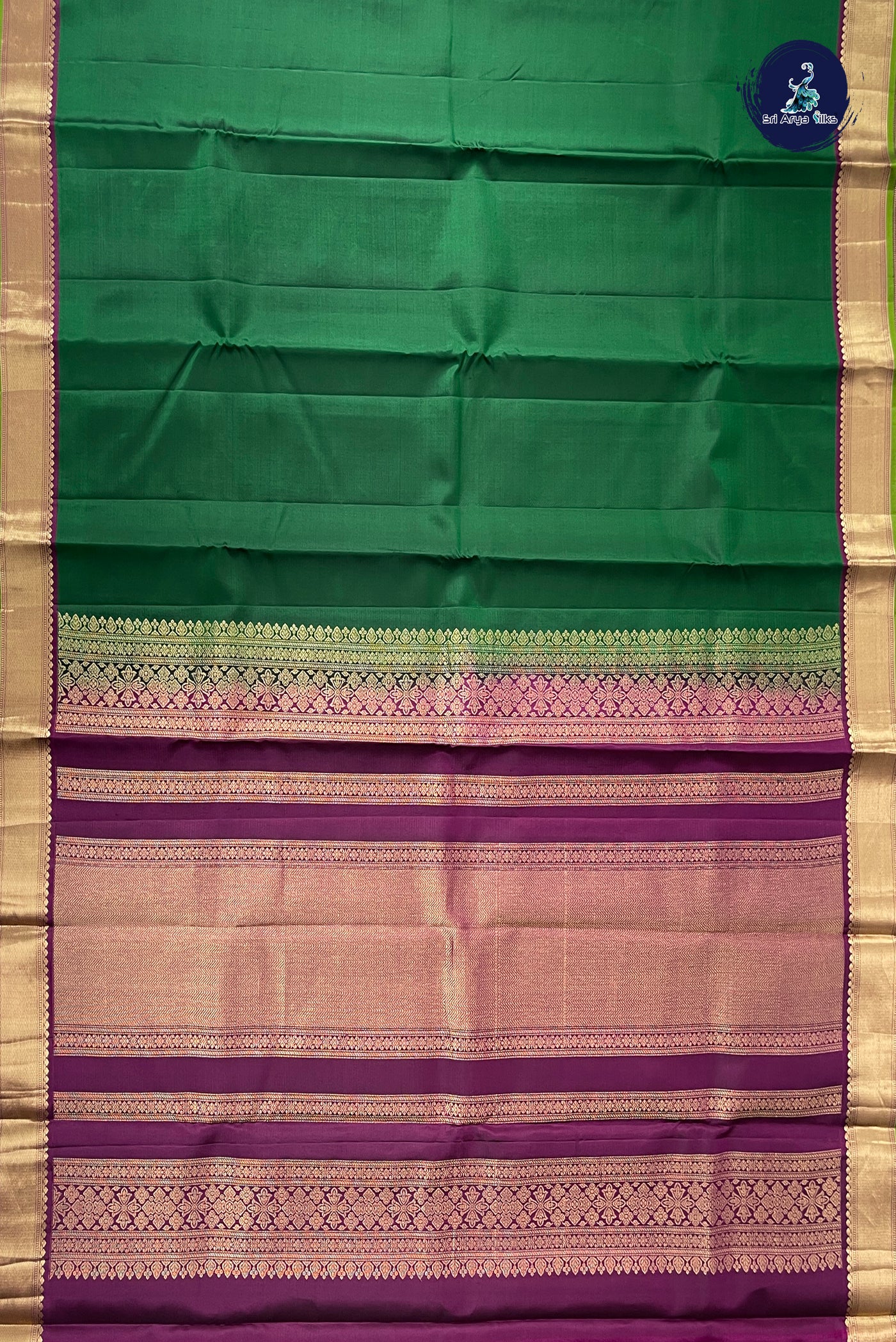 Dark Green Light Weight Silk Saree With Plain Pattern