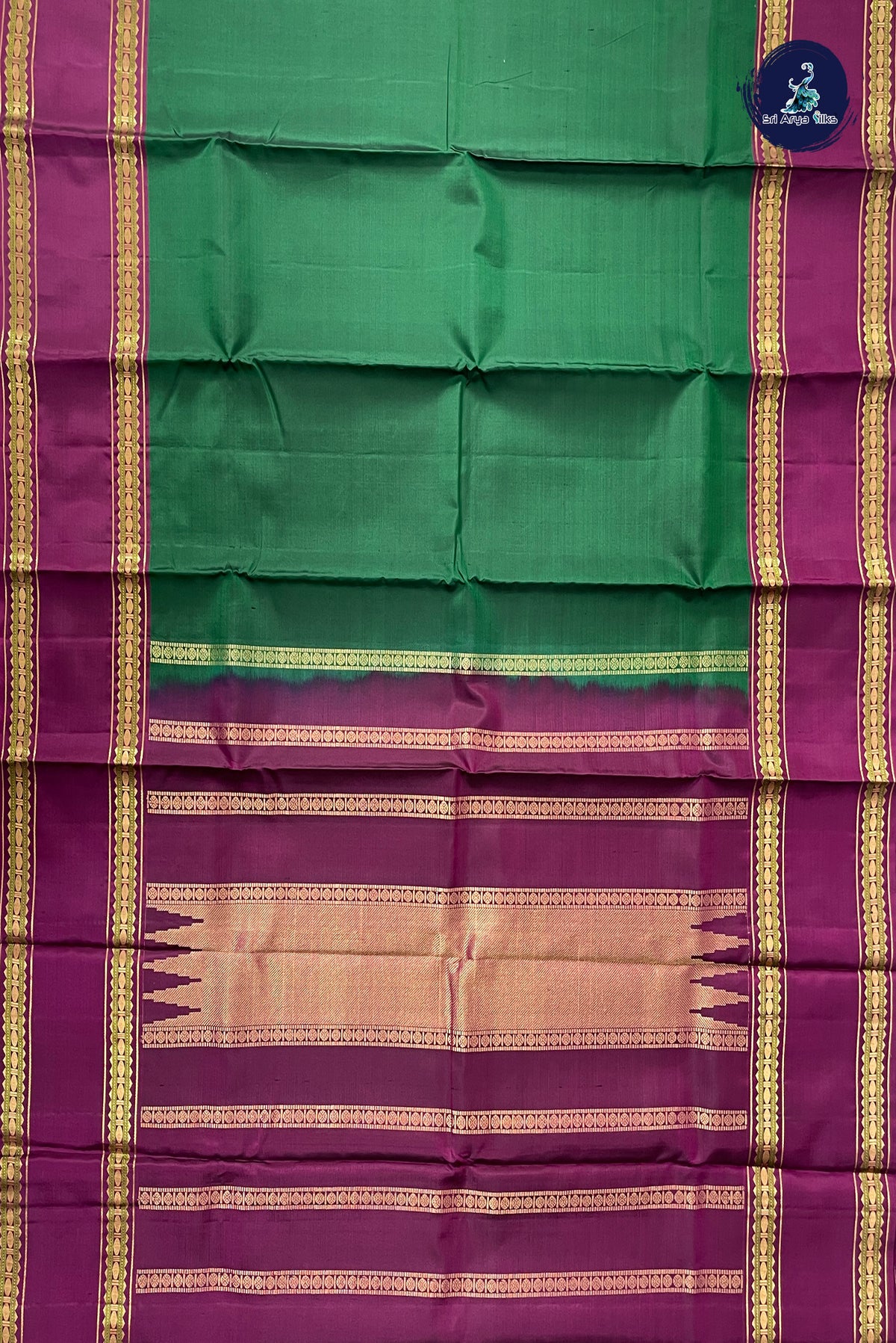 Dark Green Rettaippade Border Silk Saree With Plain Pattern