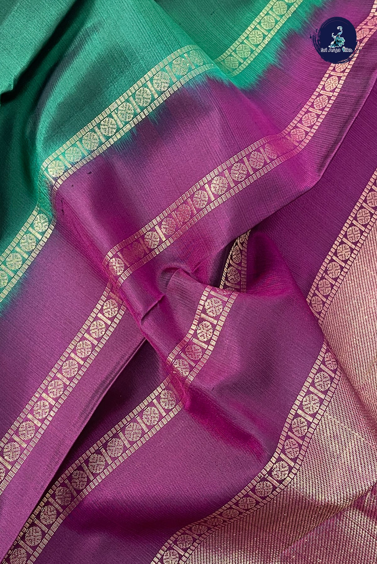 Dark Green Rettaippade Border Silk Saree With Plain Pattern