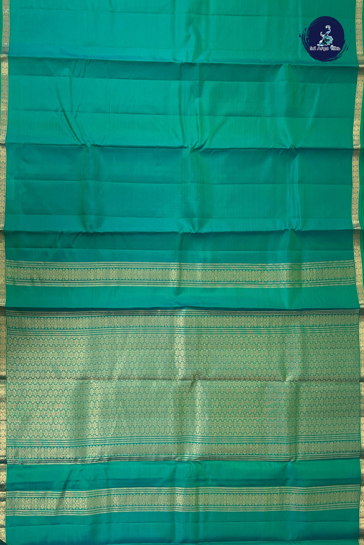 Bluish Green Rettaippade Border Silk Saree With Doria Lines Pattern