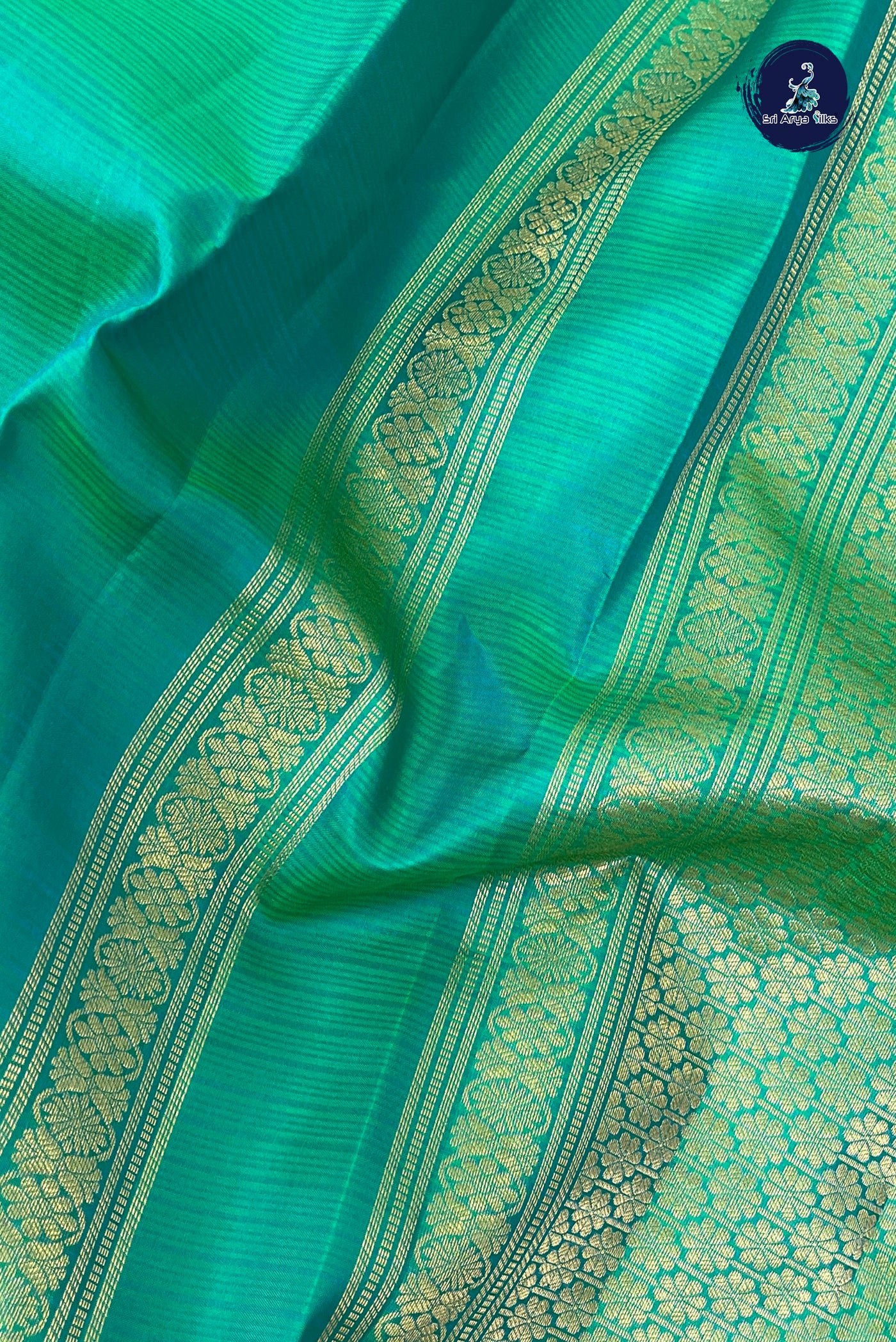 Bluish Green Rettaippade Border Silk Saree With Doria Lines Pattern