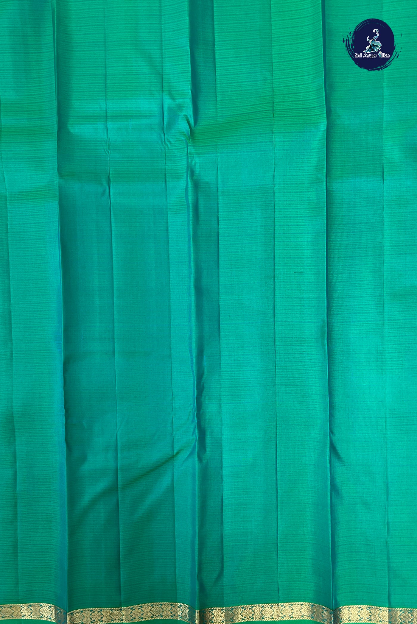 Bluish Green Rettaippade Border Silk Saree With Doria Lines Pattern