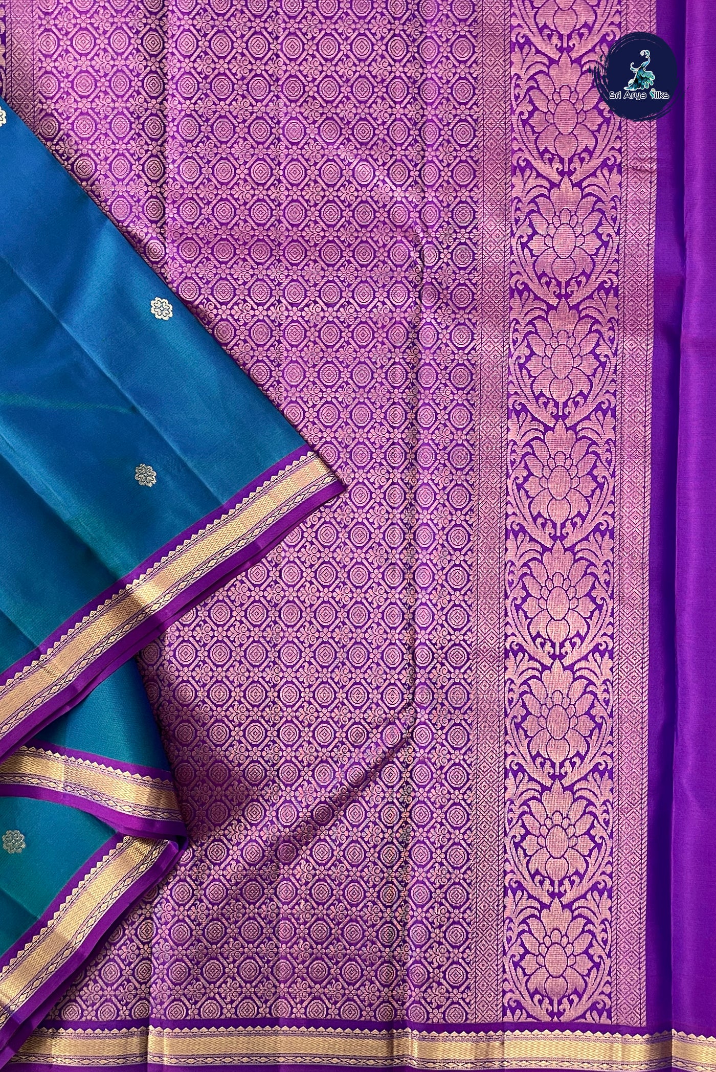 Peacock Blue Traditional Silk Saree With Zari Buttas Pattern