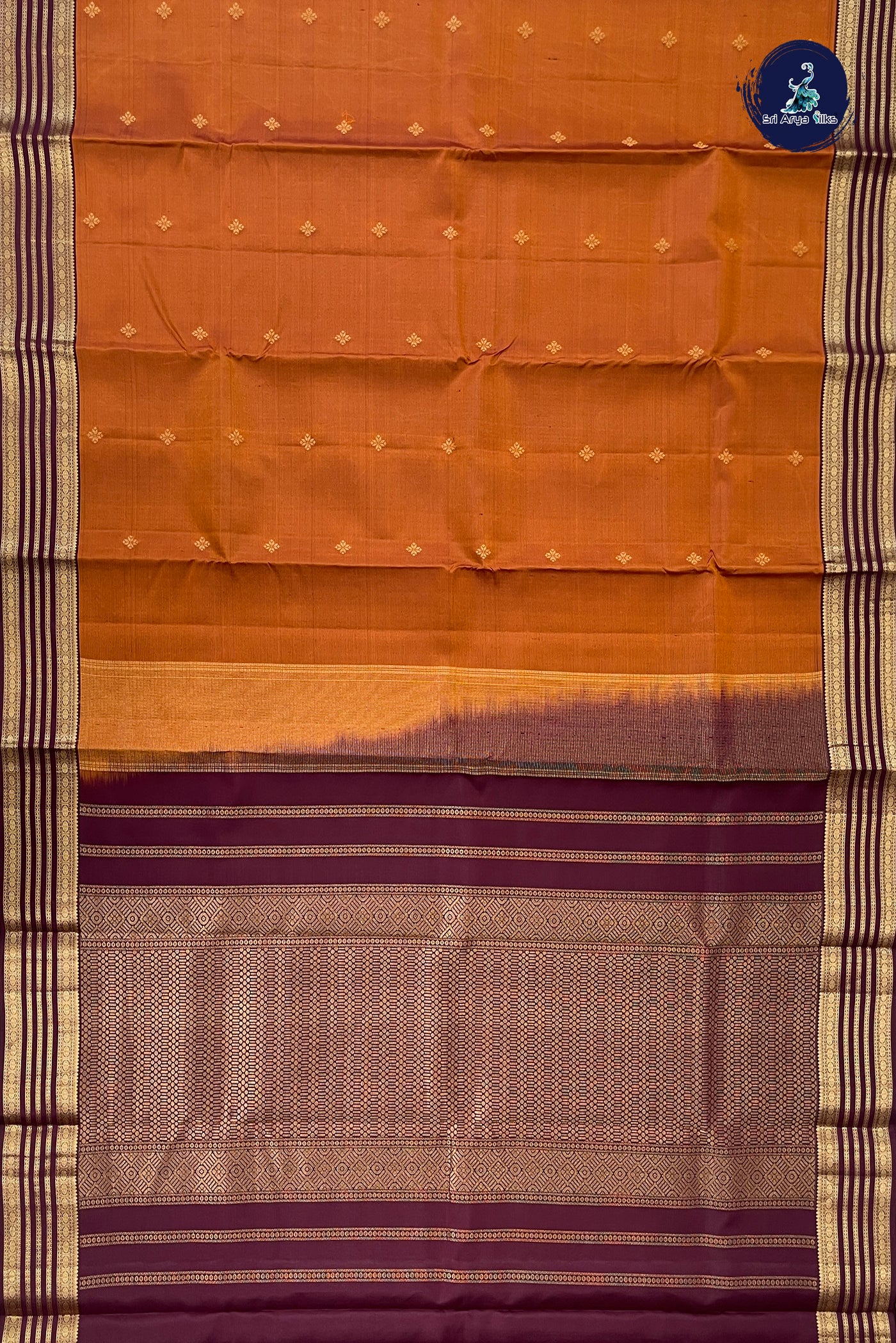 Rust Traditional Silk Saree With Zari Buttas Pattern
