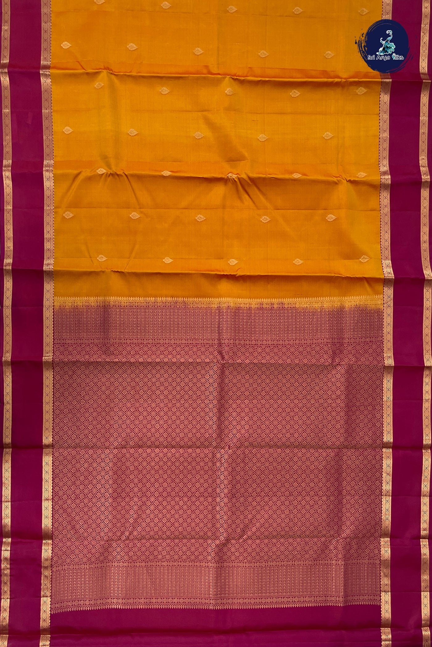 Lite Mustard Orange Rettaippade Border Silk Saree With Zari Buttas Pattern
