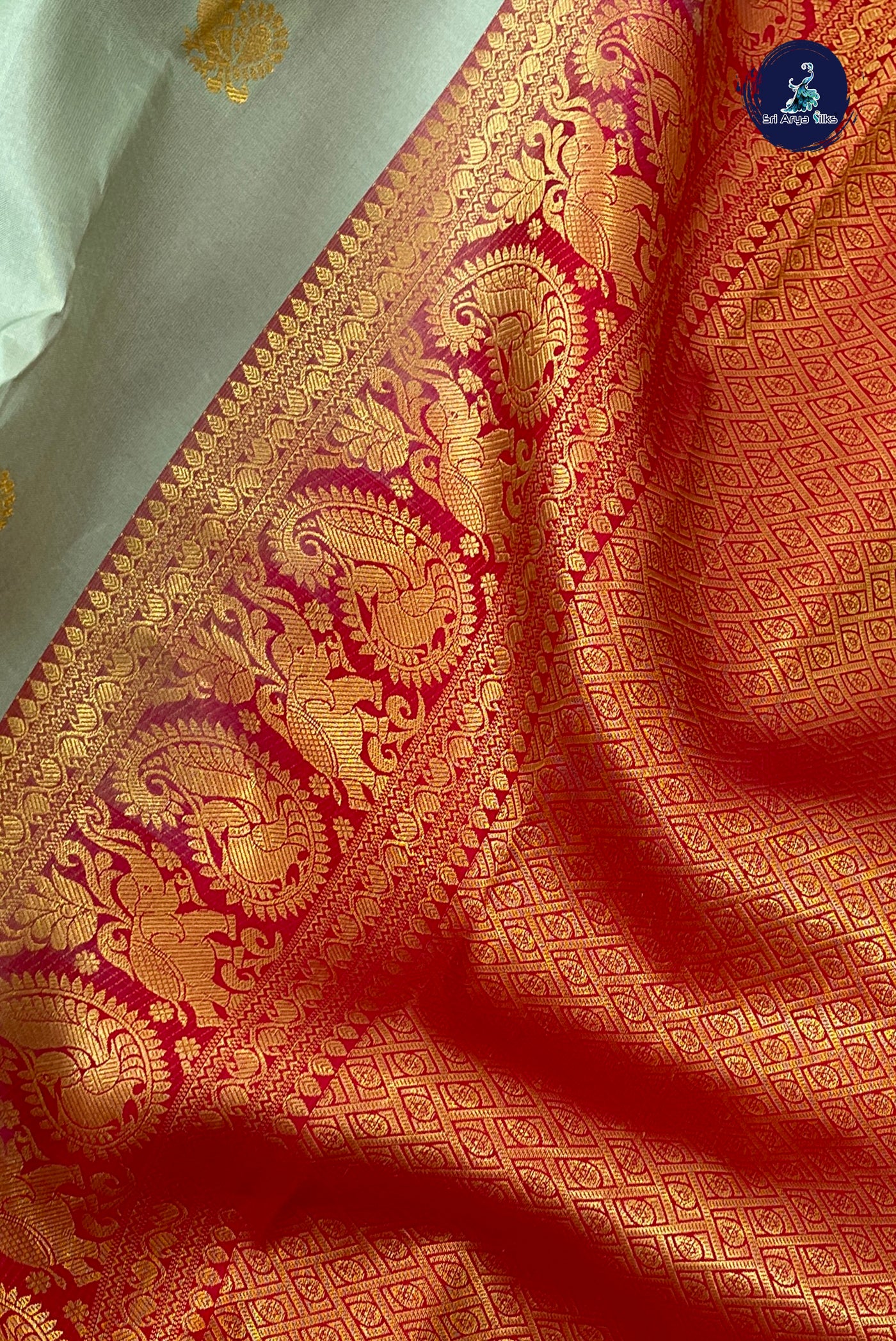 Pastel Green Korvai Contrast Silk Saree With Zari Buttas Pattern