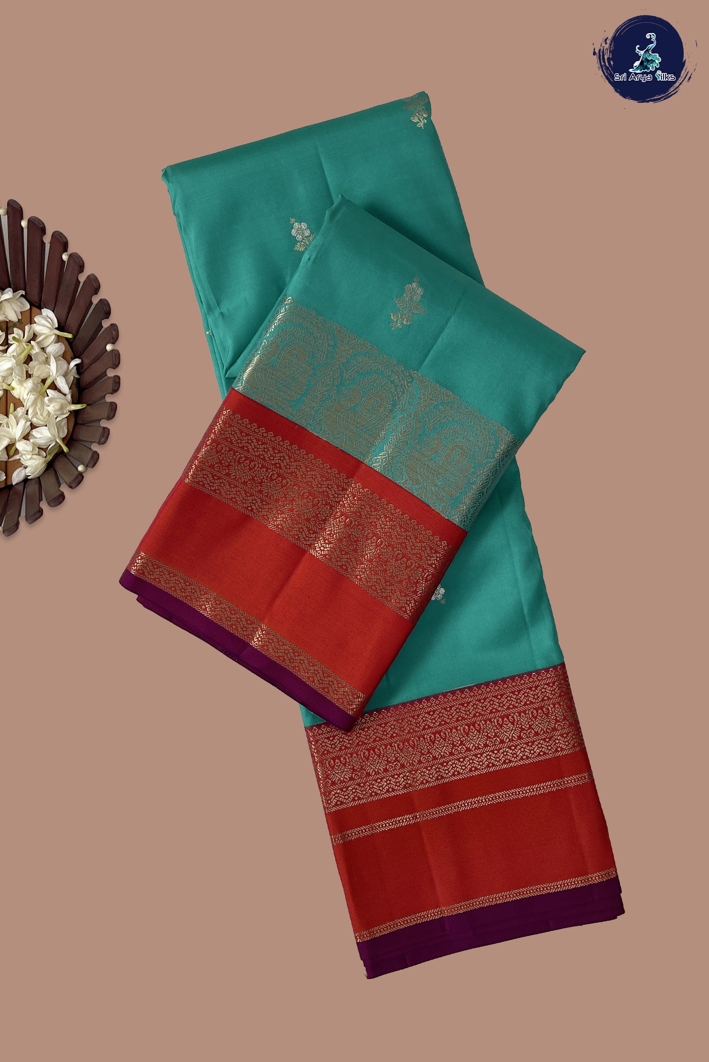 Turquoise Traditional Silk Saree With Zari Buttas Pattern