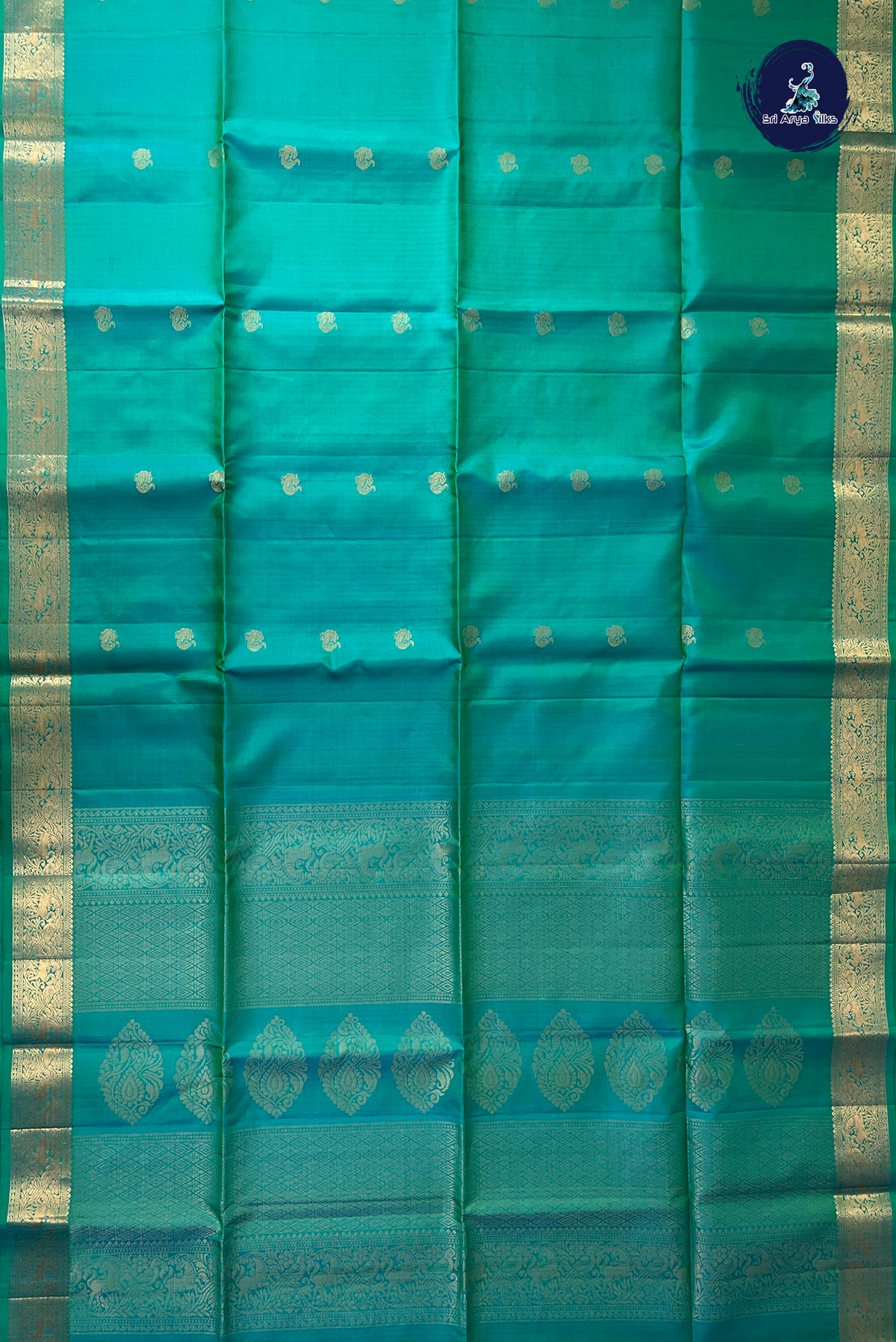 Bluish Green Soft Silk Saree With Zari Buttas Pattern