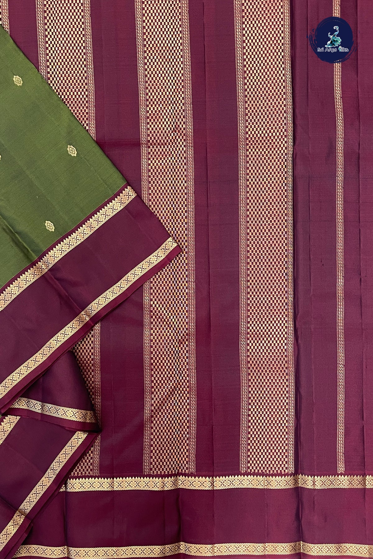 Green Light Weight Silk Saree With Zari Buttas Pattern