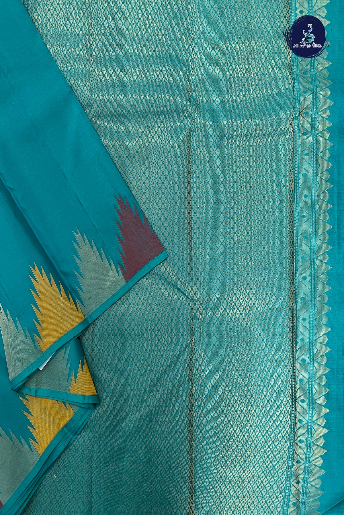 Teal Thalampoo / Temple Border Silk Saree With Plain Pattern