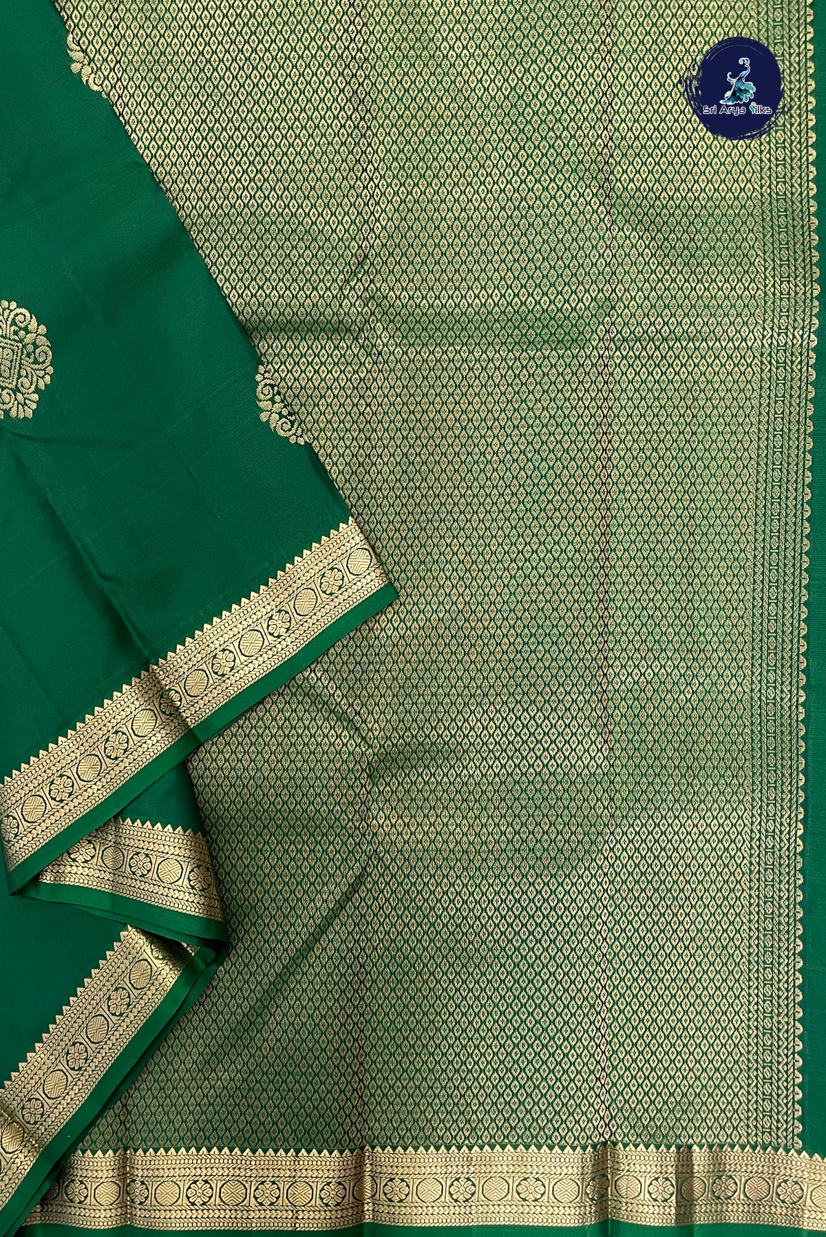 Dark Green Light Weight Silk Saree With Zari Buttas Pattern