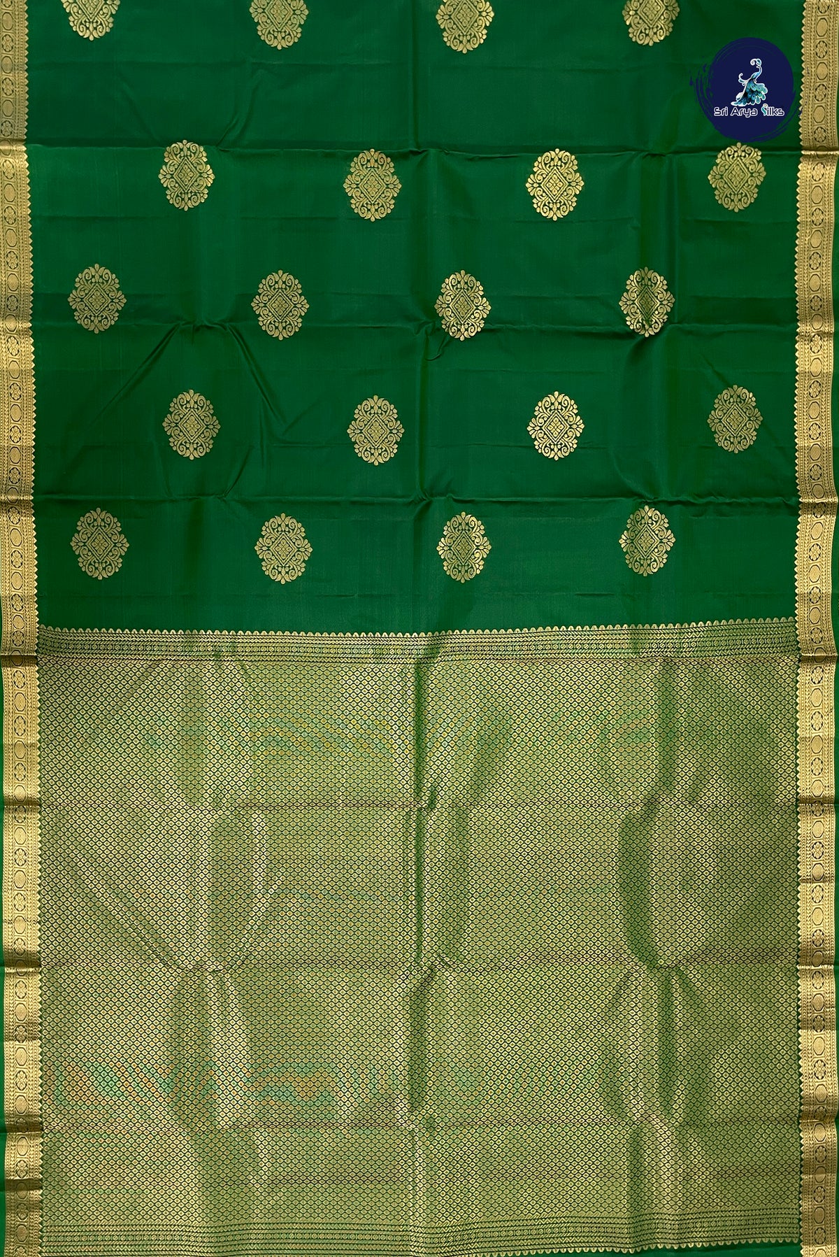 Dark Green Light Weight Silk Saree With Zari Buttas Pattern