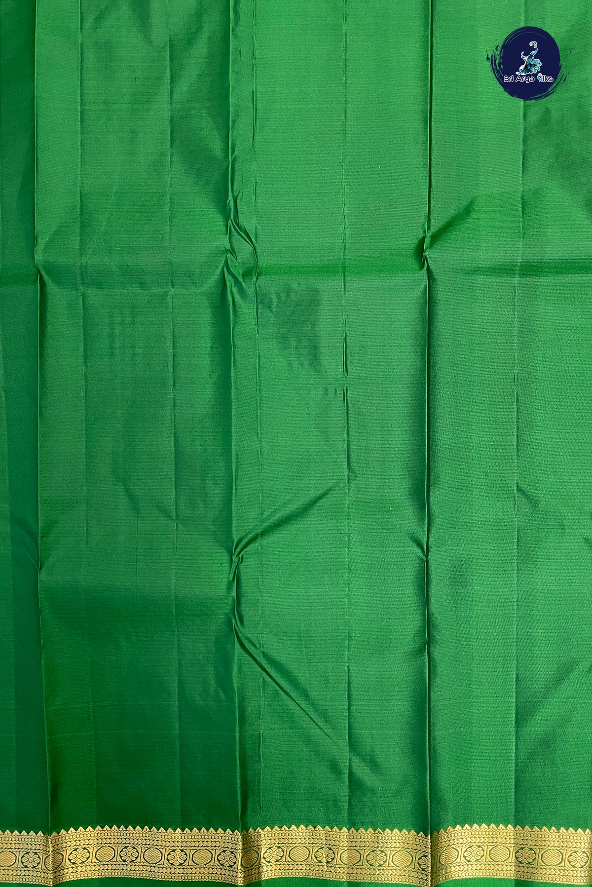 Dark Green Light Weight Silk Saree With Zari Buttas Pattern