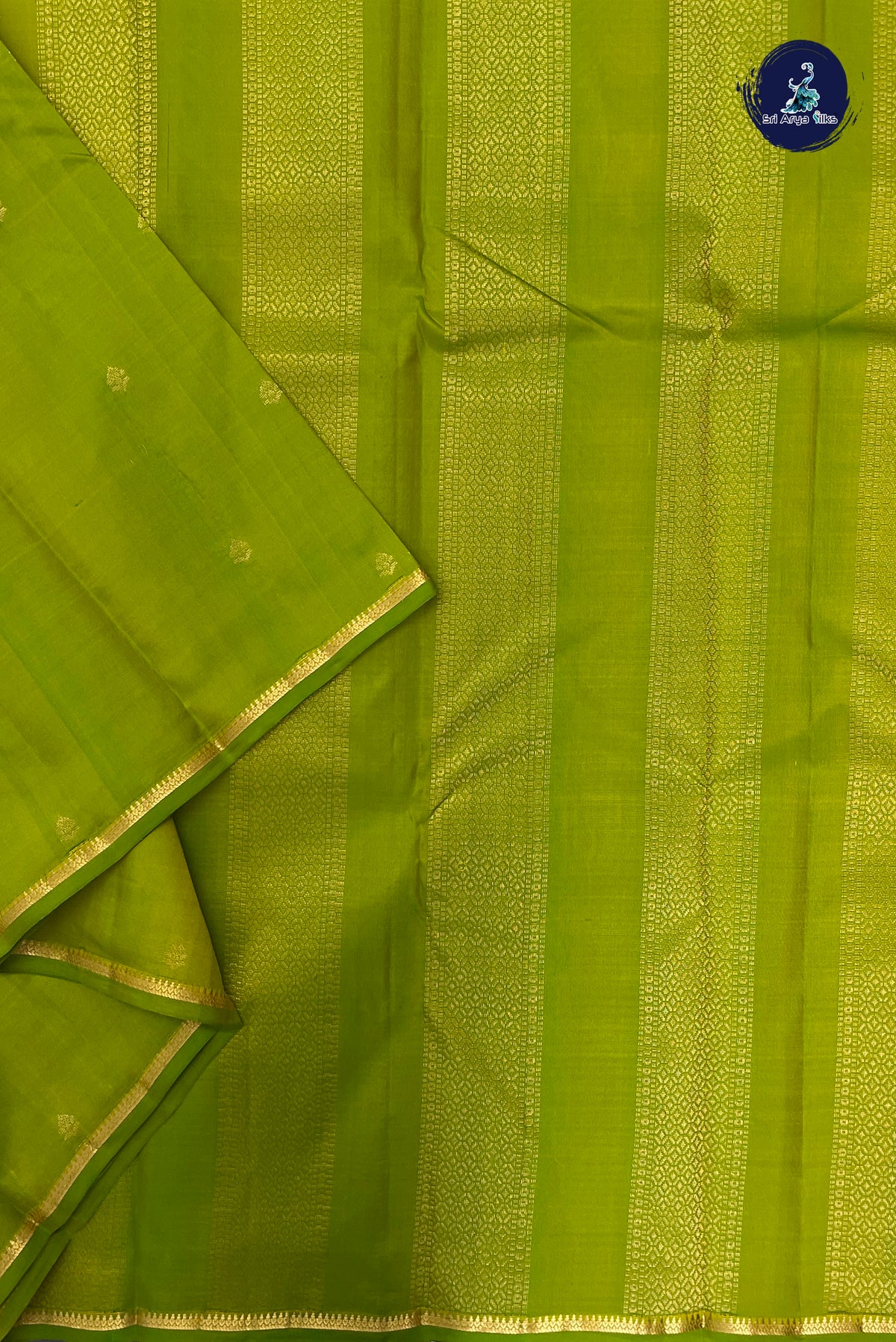 Lime Green Light Weight Silk Saree With Zari Buttas Pattern