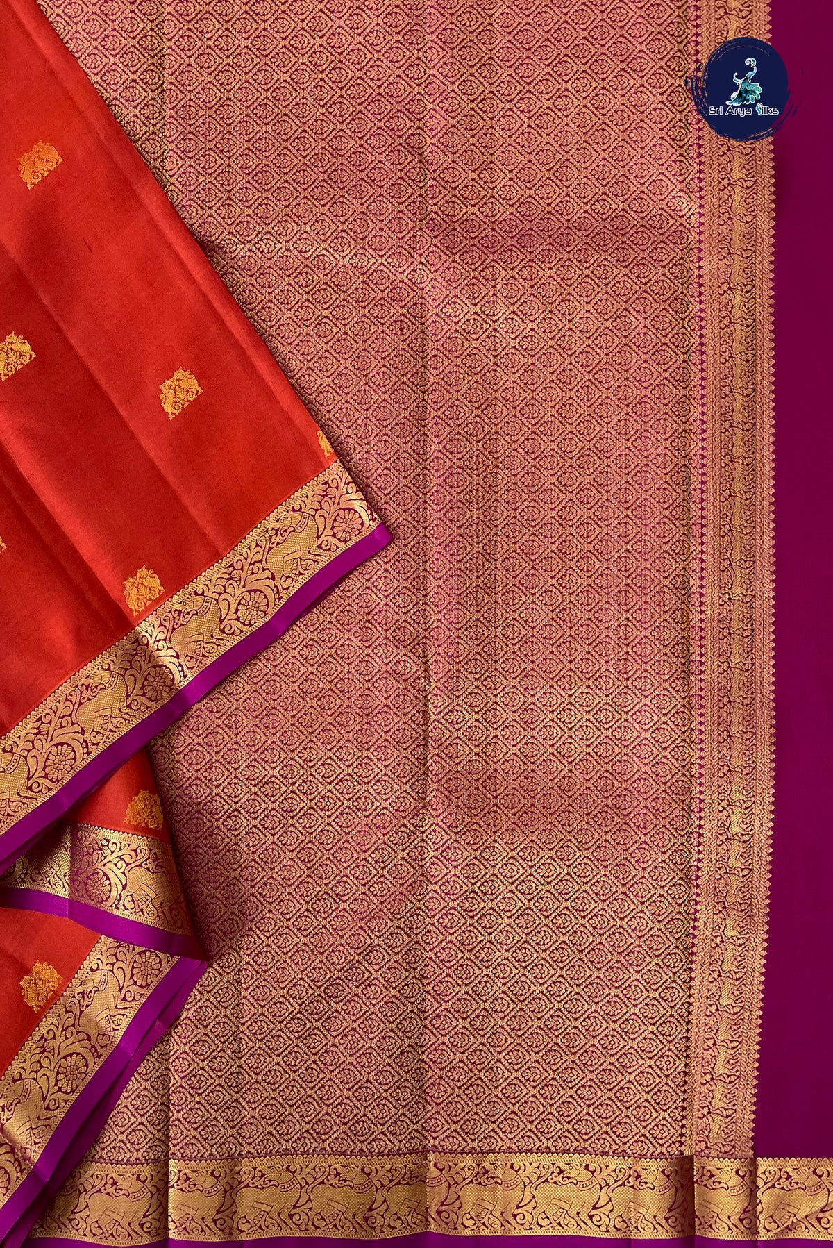 Reddish Orange Light Weight Silk Saree With Zari Buttas Pattern
