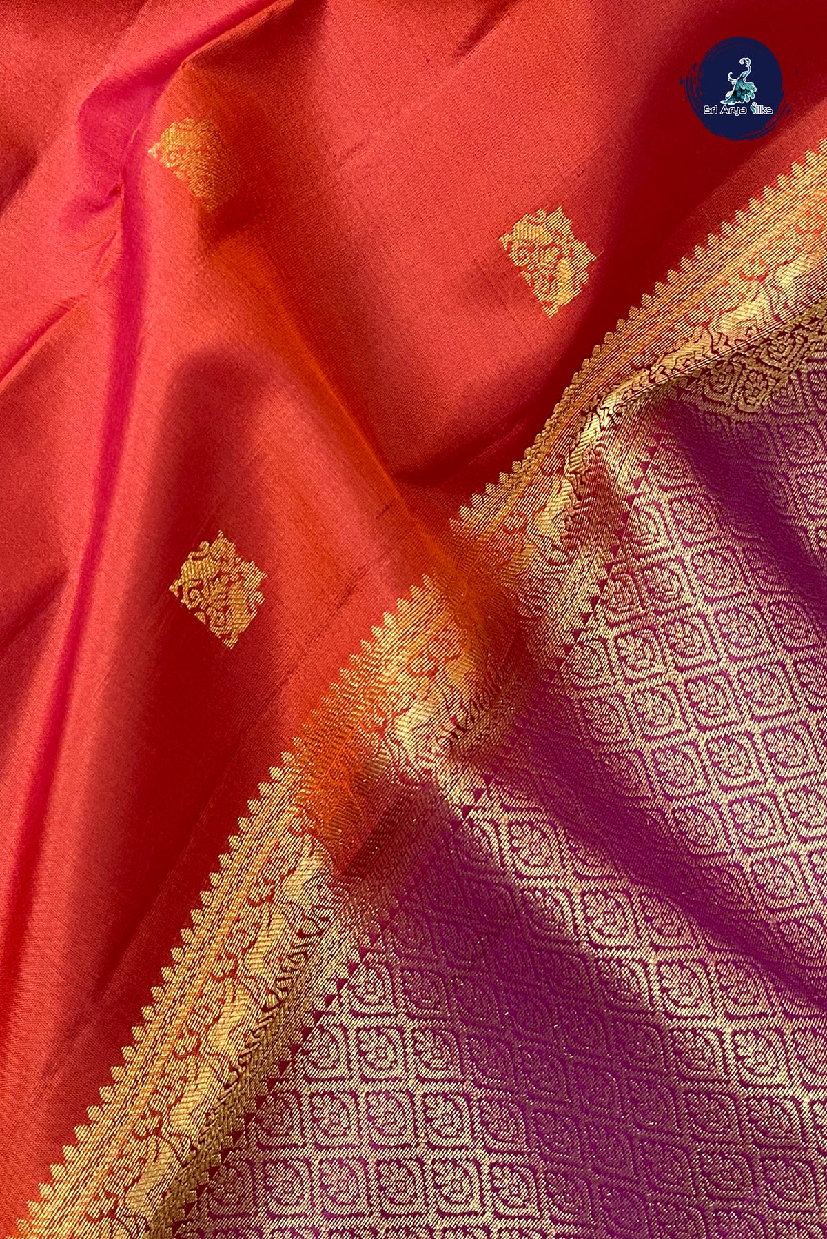 Reddish Orange Light Weight Silk Saree With Zari Buttas Pattern