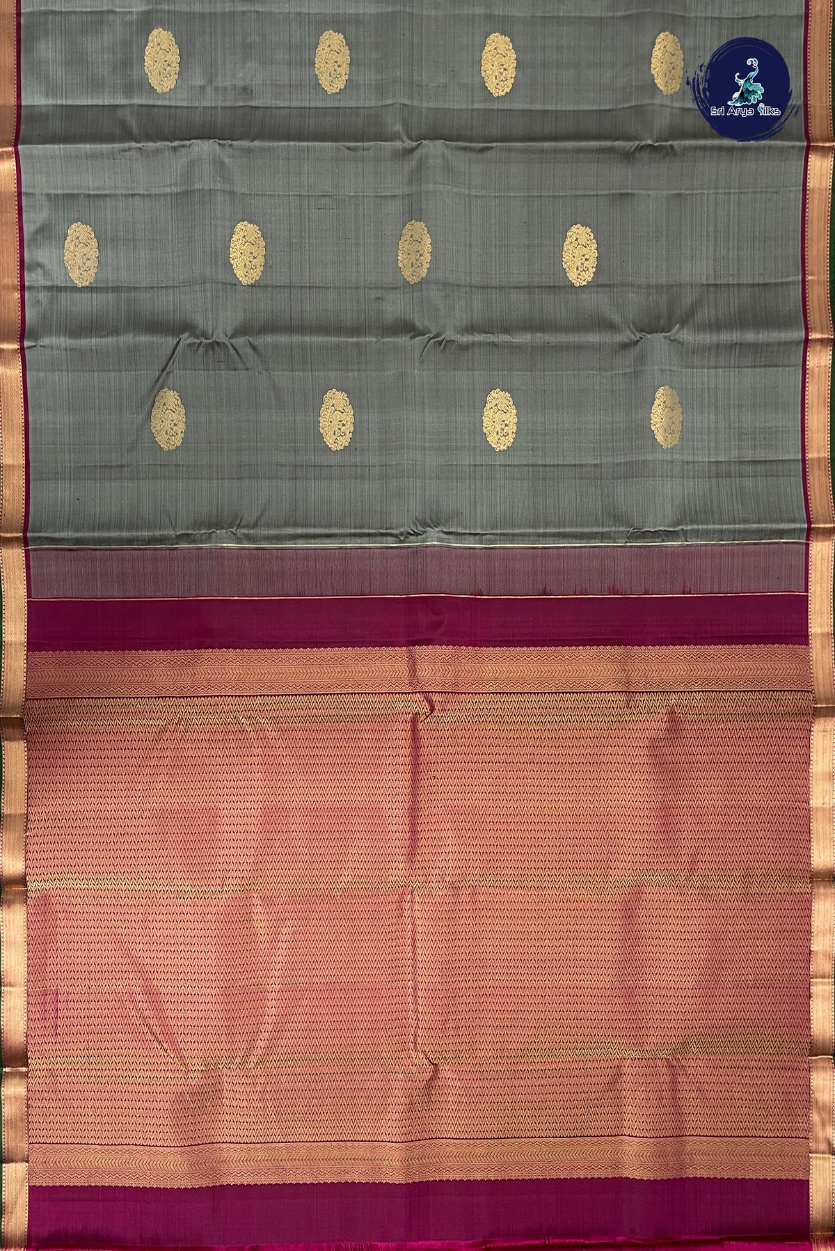 Greenish Grey Mayil Chakram Butta Silk Saree With Zari Buttas Pattern