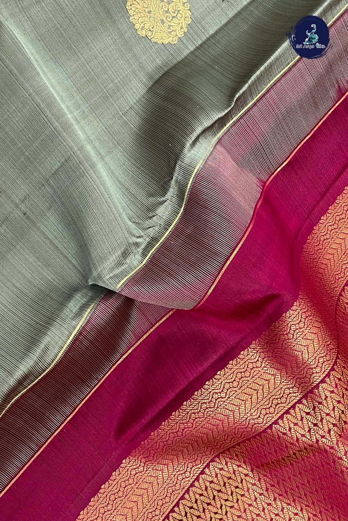 Greenish Grey Mayil Chakram Butta Silk Saree With Zari Buttas Pattern