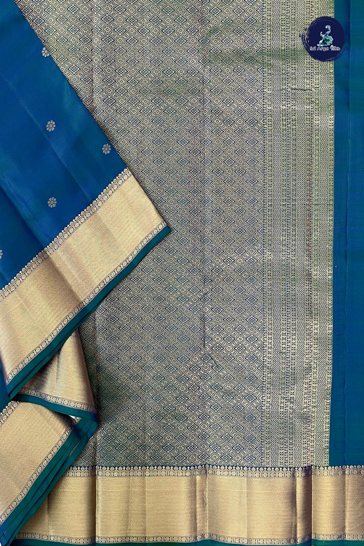 Peacock Blue Bridal Silk Saree With Zari Buttas Pattern