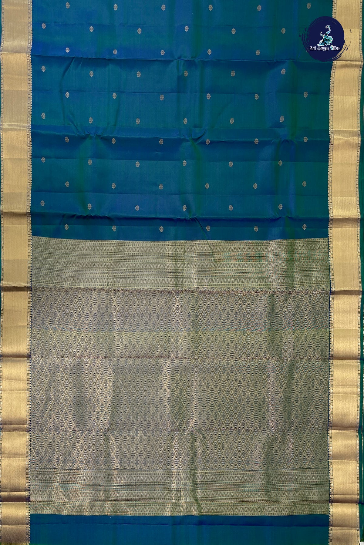 Peacock Blue Bridal Silk Saree With Zari Buttas Pattern