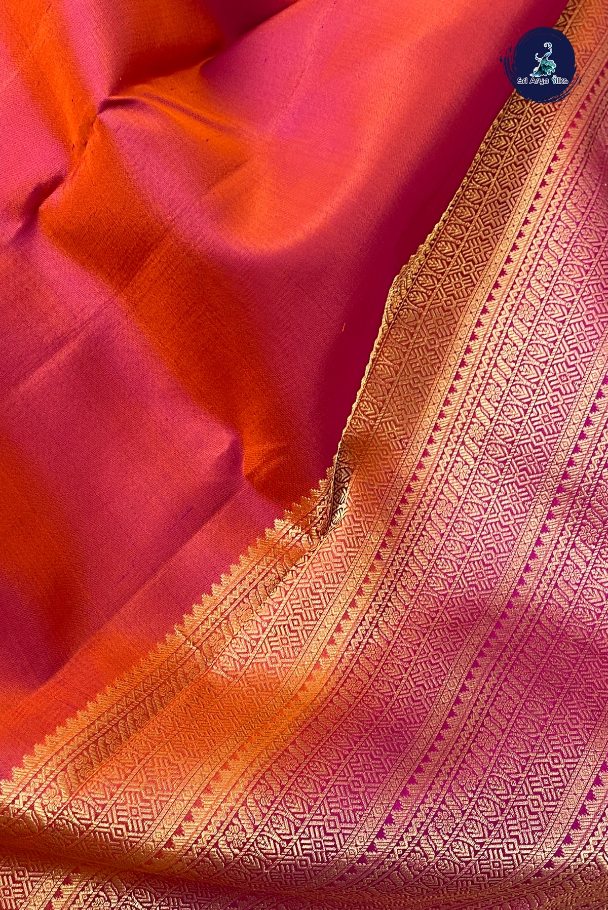 Orangish Pink Thalampoo / Temple Border Silk Saree With Plain Pattern
