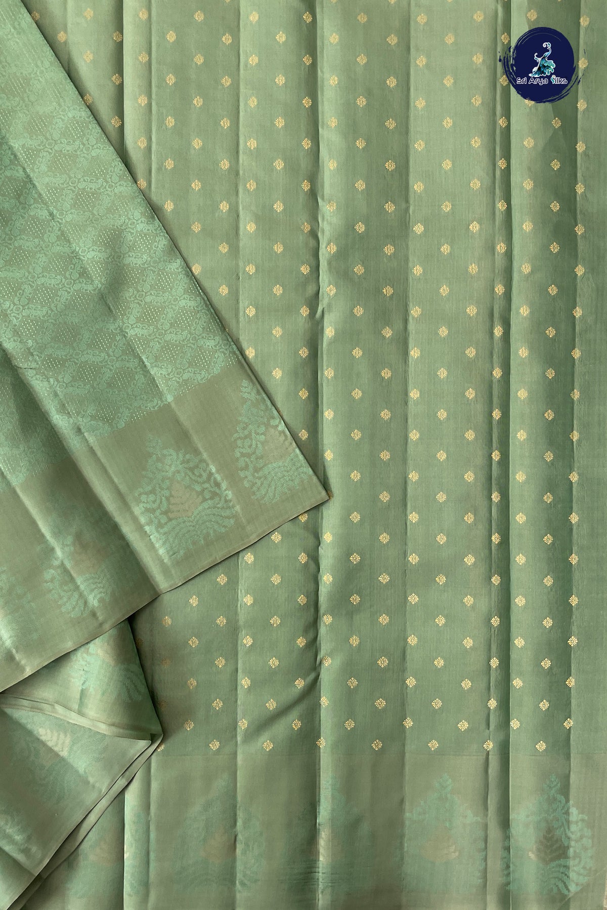 Pastel Green Thread Work Silk Saree With Embossed Pattern