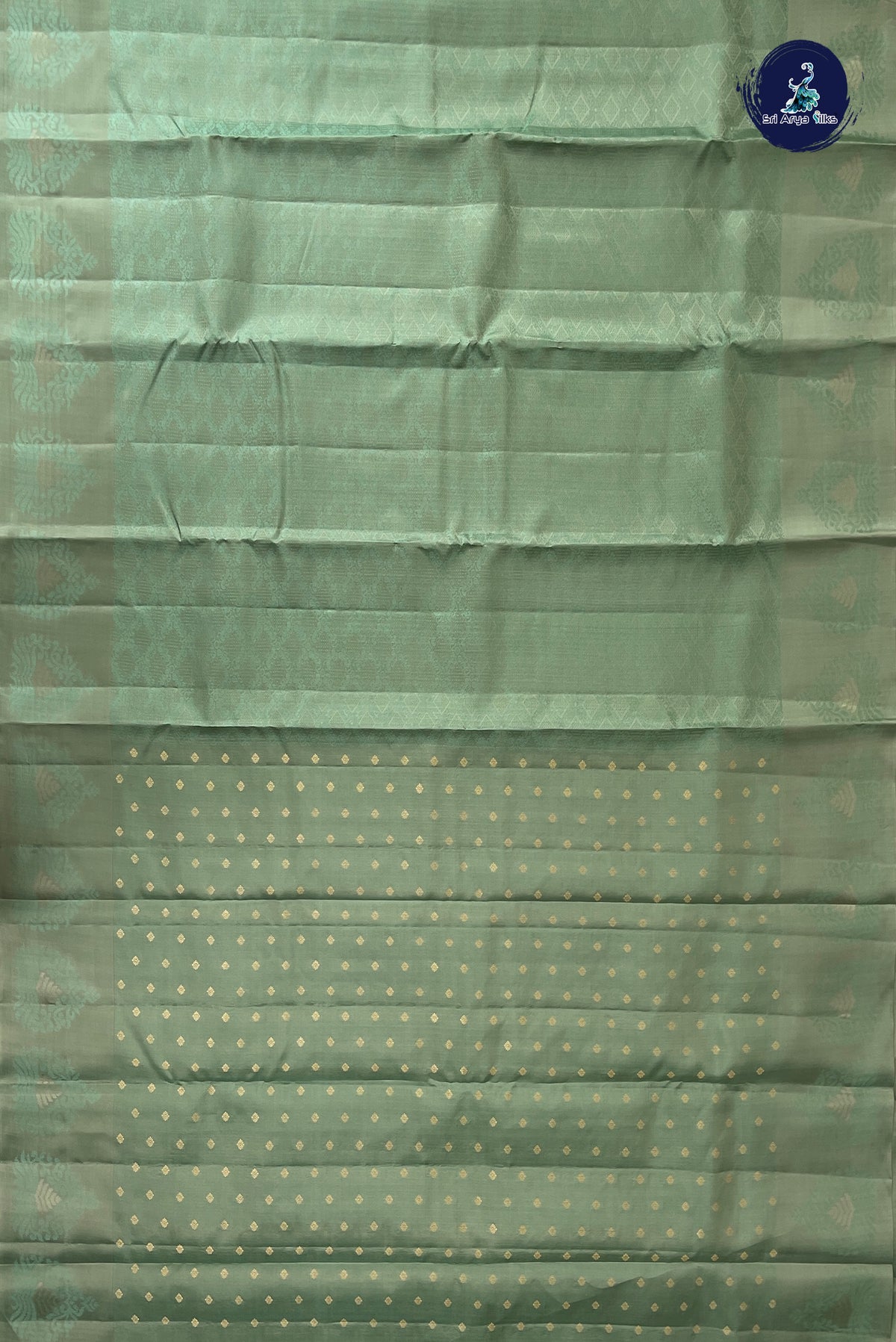 Pastel Green Thread Work Silk Saree With Embossed Pattern