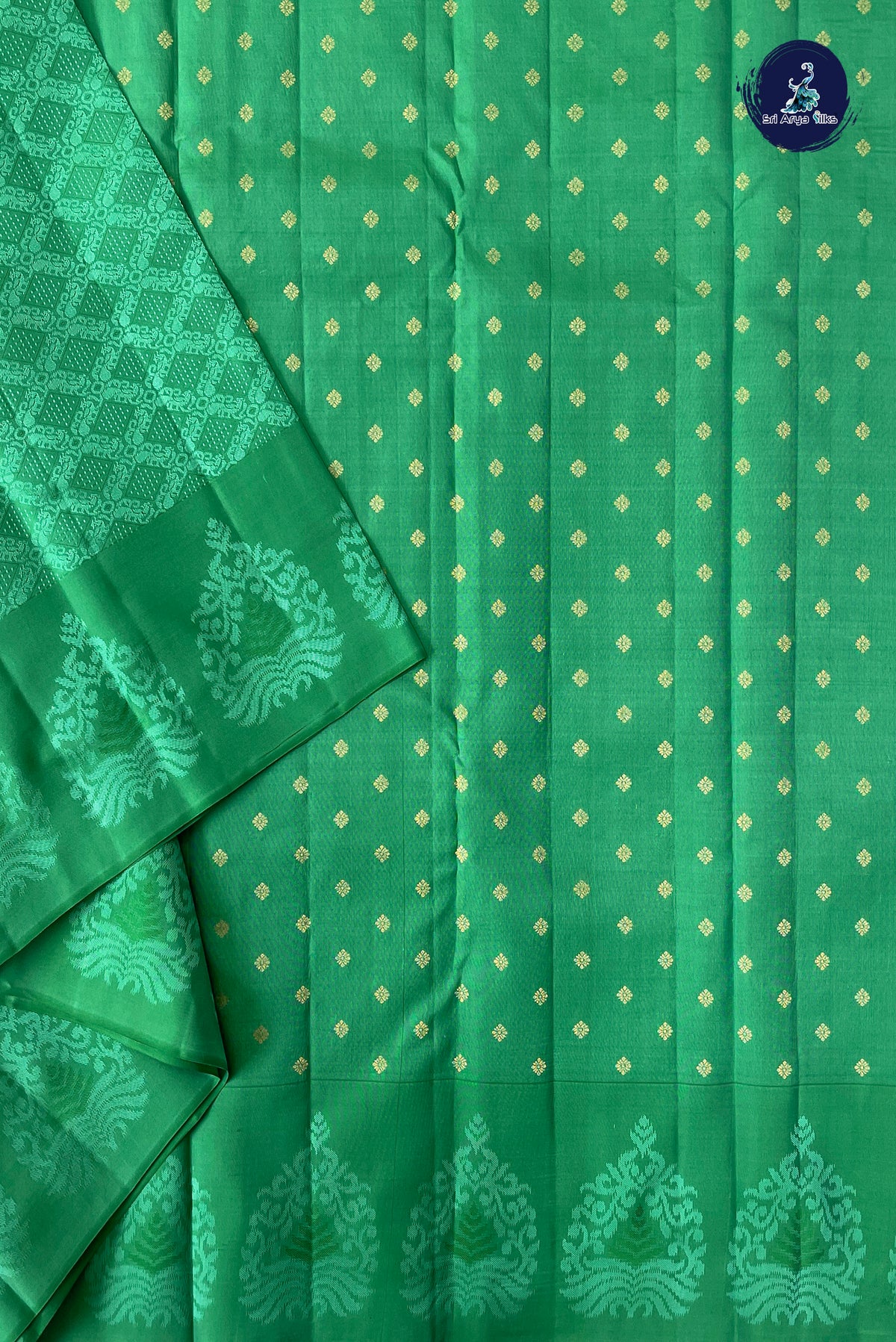 Green Thread Work Silk Saree With Embossed Pattern
