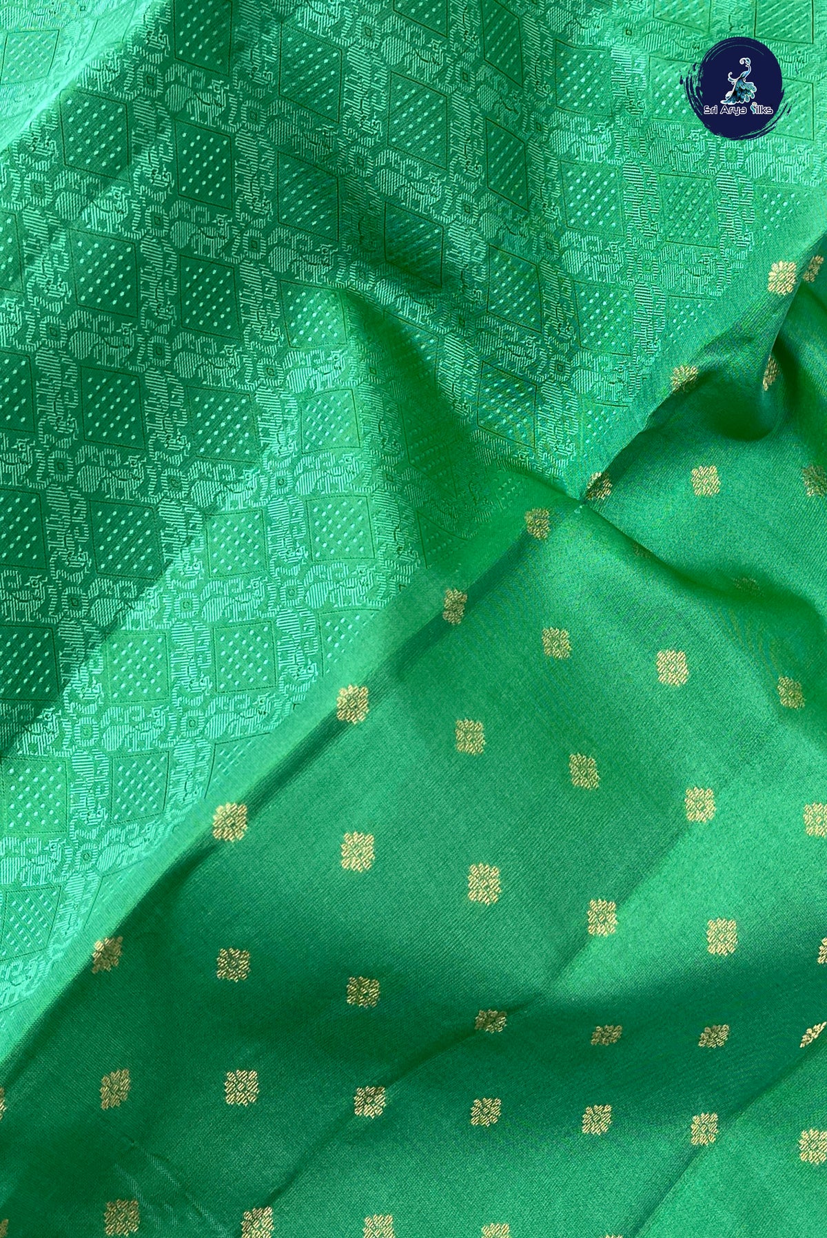 Green Thread Work Silk Saree With Embossed Pattern