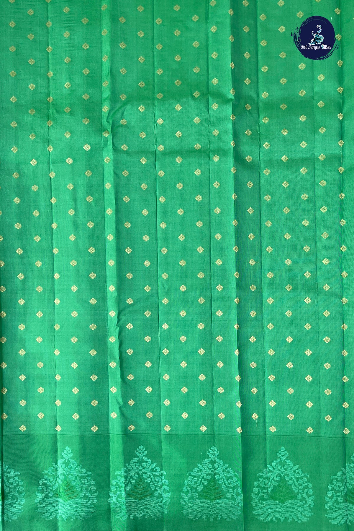 Green Thread Work Silk Saree With Embossed Pattern