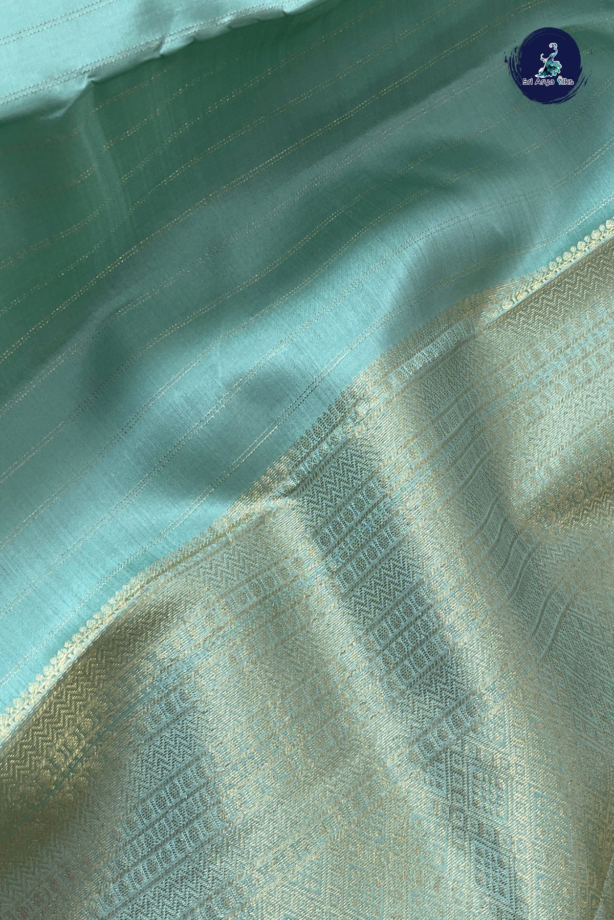 Pastel Green Bridal Silk Saree With Stripes Pattern