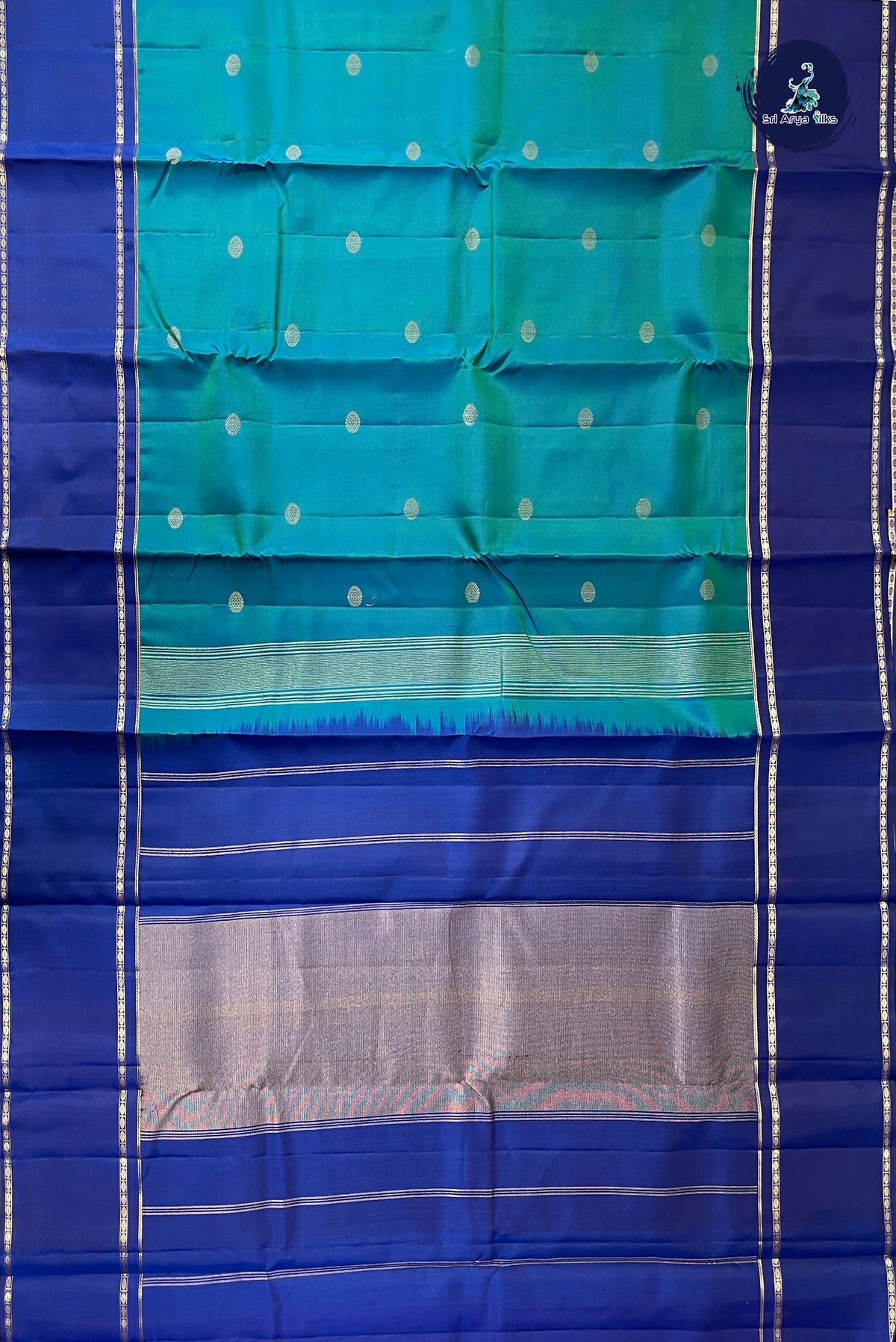 Peacock Blue Rettaippade Border Silk Saree With Zari Buttas Pattern