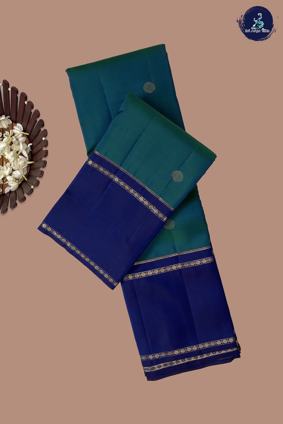 Peacock Blue Rettaippade Border Silk Saree With Zari Buttas Pattern