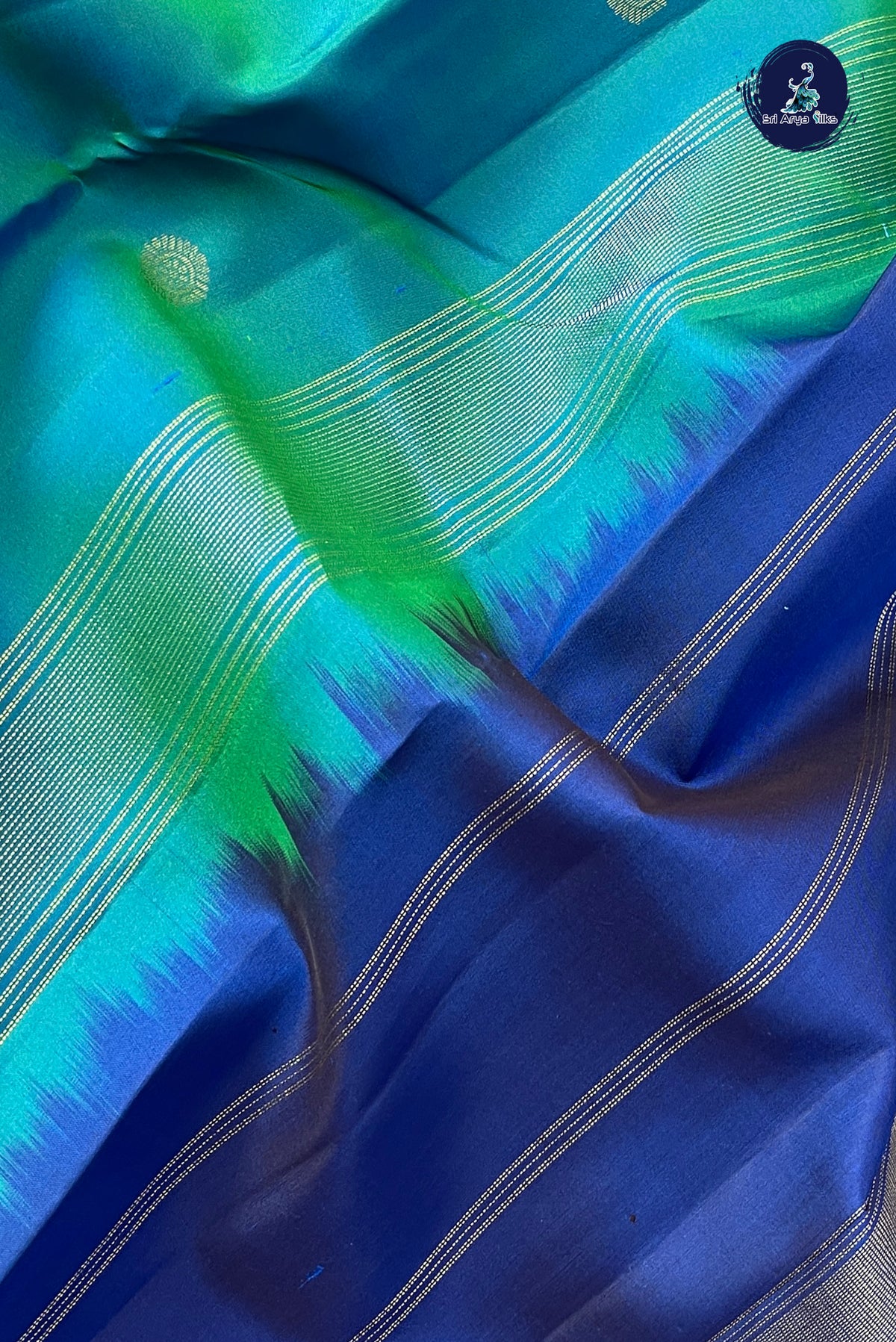 Peacock Blue Rettaippade Border Silk Saree With Zari Buttas Pattern