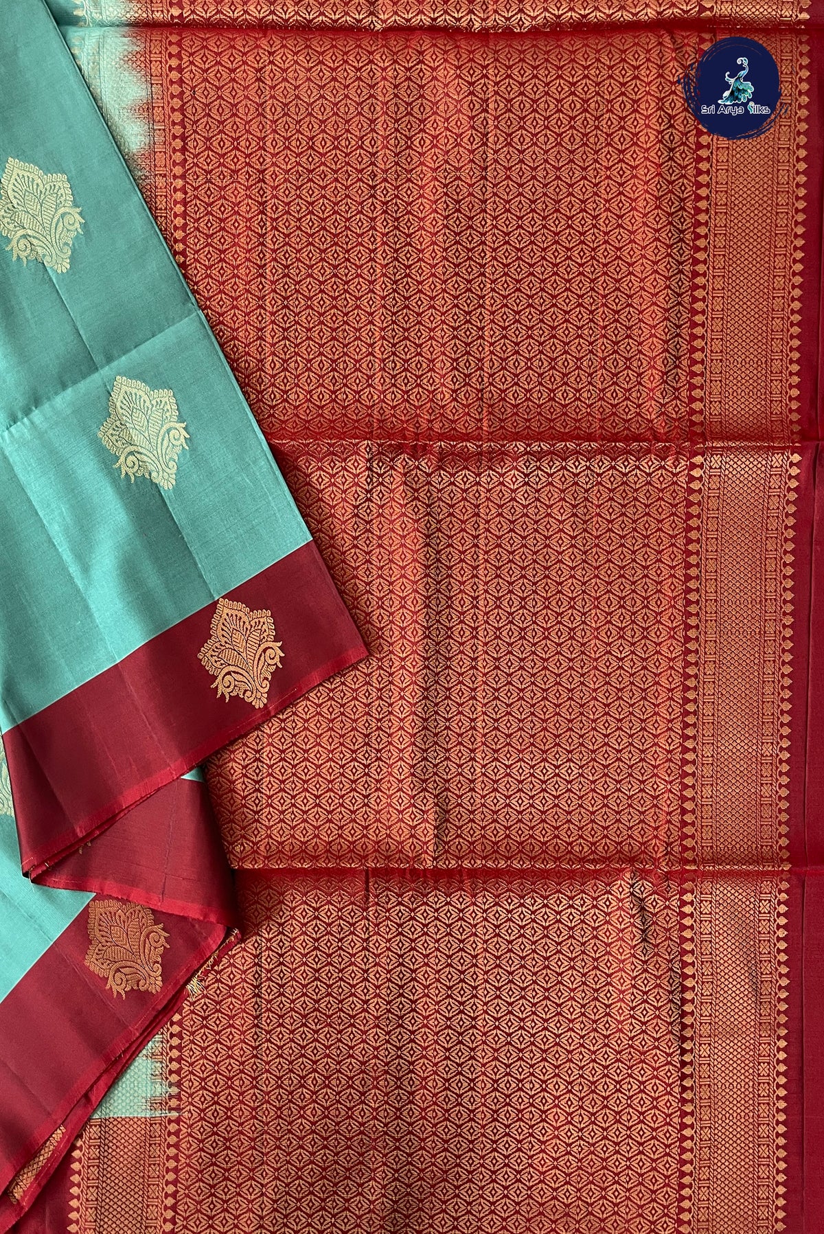Bluish Green Half Pure Silk Saree With Zari Buttas Pattern
